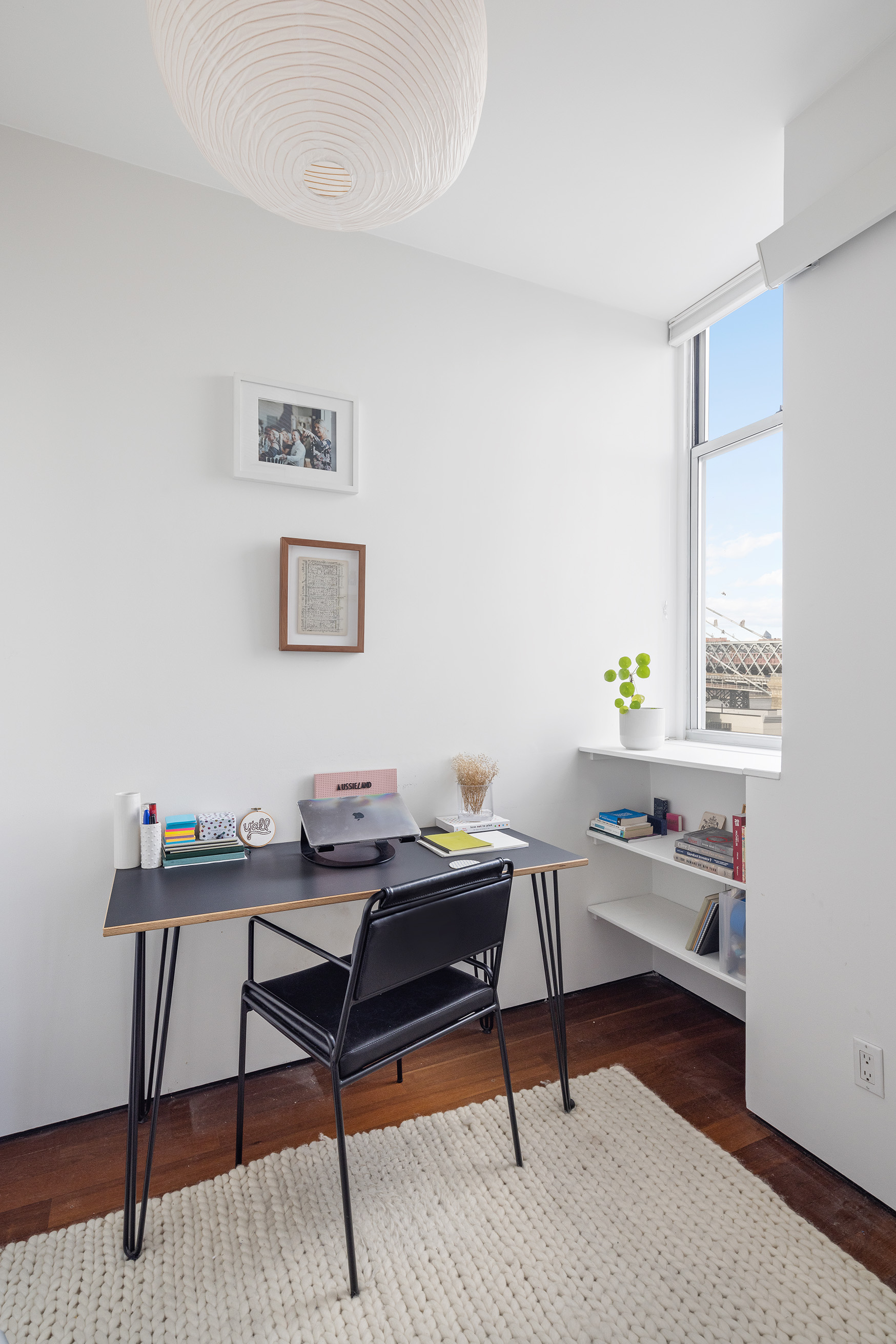 60 Broadway, Unit 6H Brooklyn, NY 11249 - Photo 8 of 16 a view of a workspace with furniture and a window