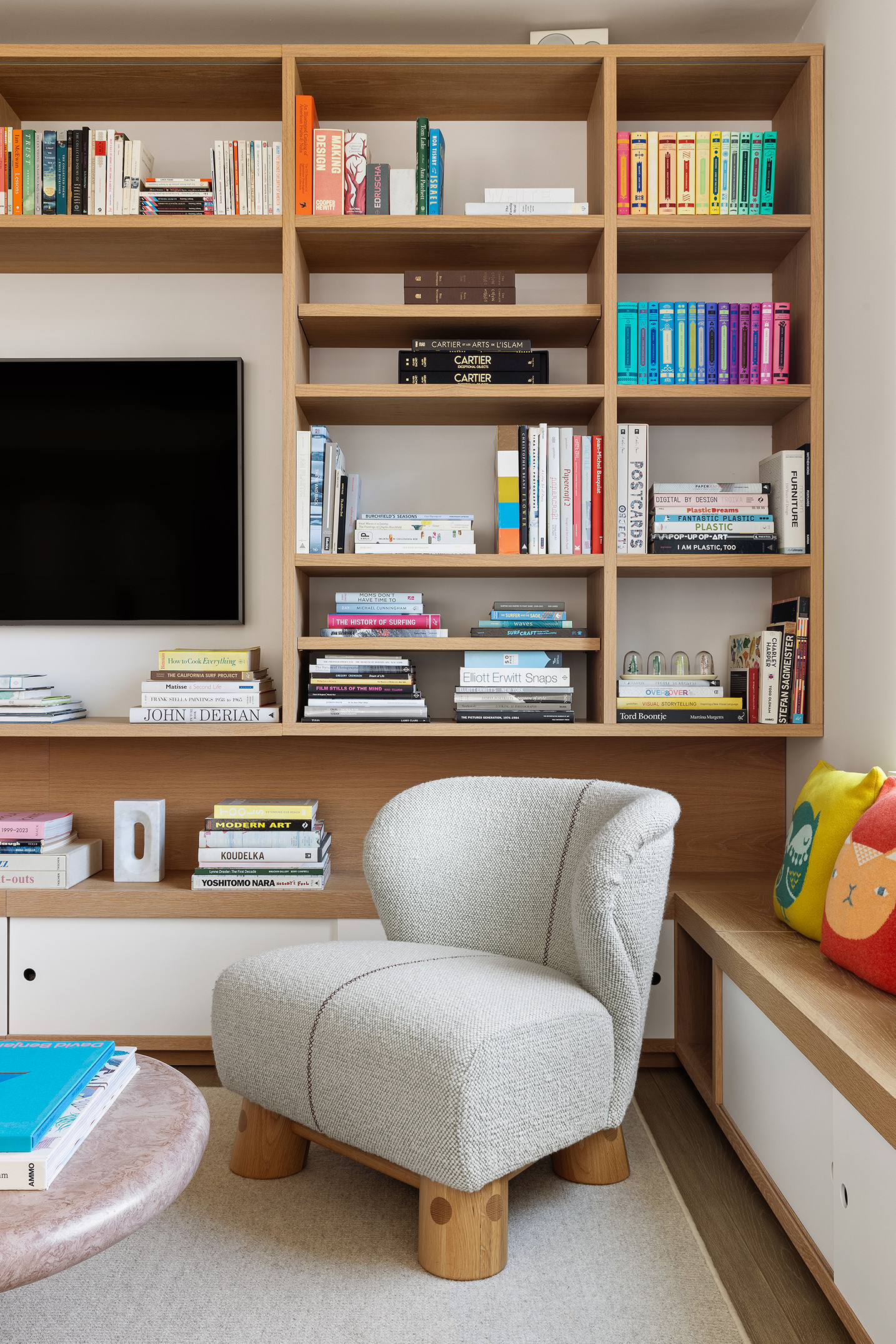 116 University Place, Unit 5 Manhattan, NY 10003 - Photo 6 of 21 a living room with furniture and a book shelf