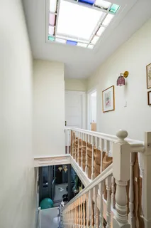 a view of entryway with stairs and a window