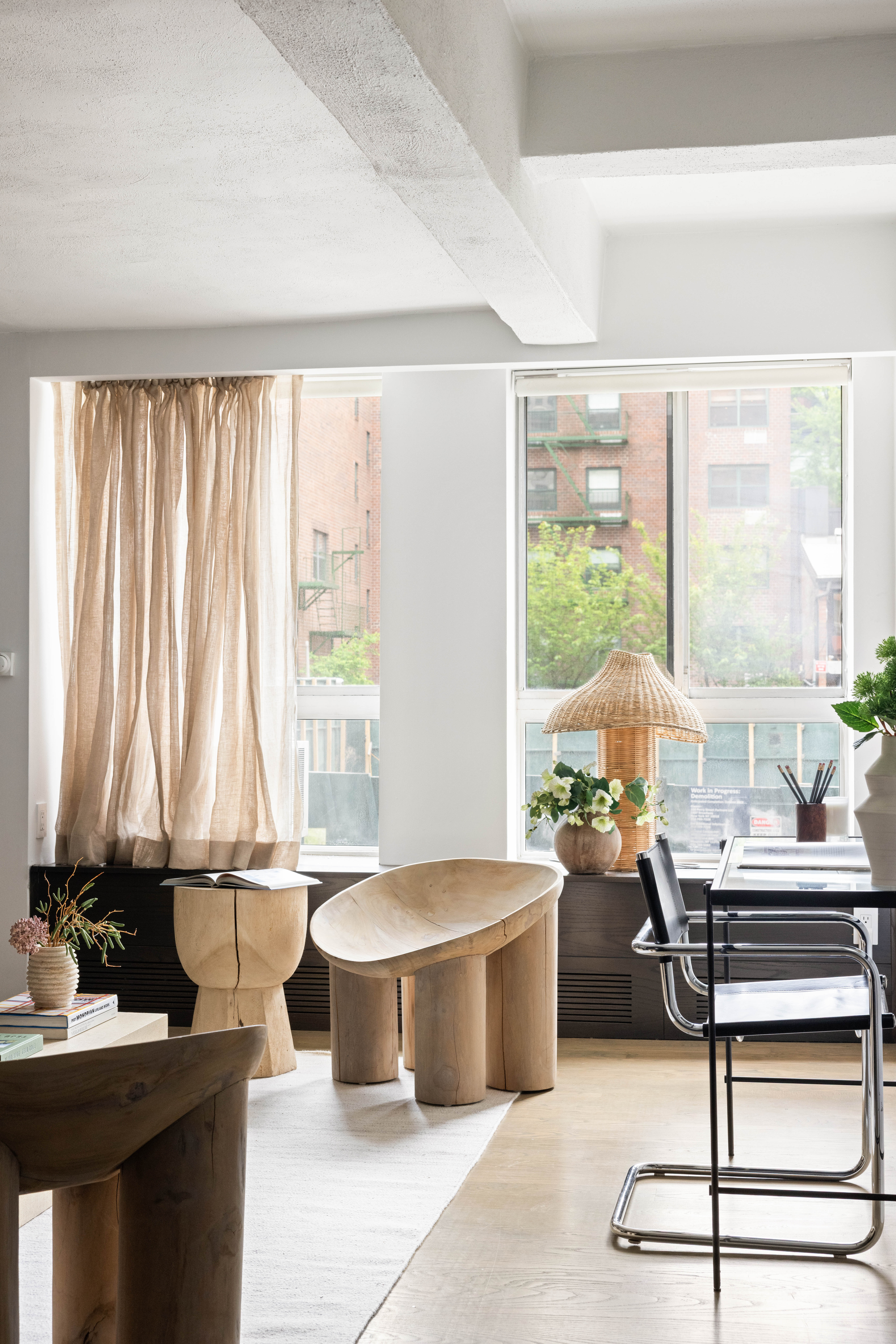 165 Perry Street, Unit 1D Manhattan, NY 10014 - Photo 10 of 13 a living room with a large window and furniture