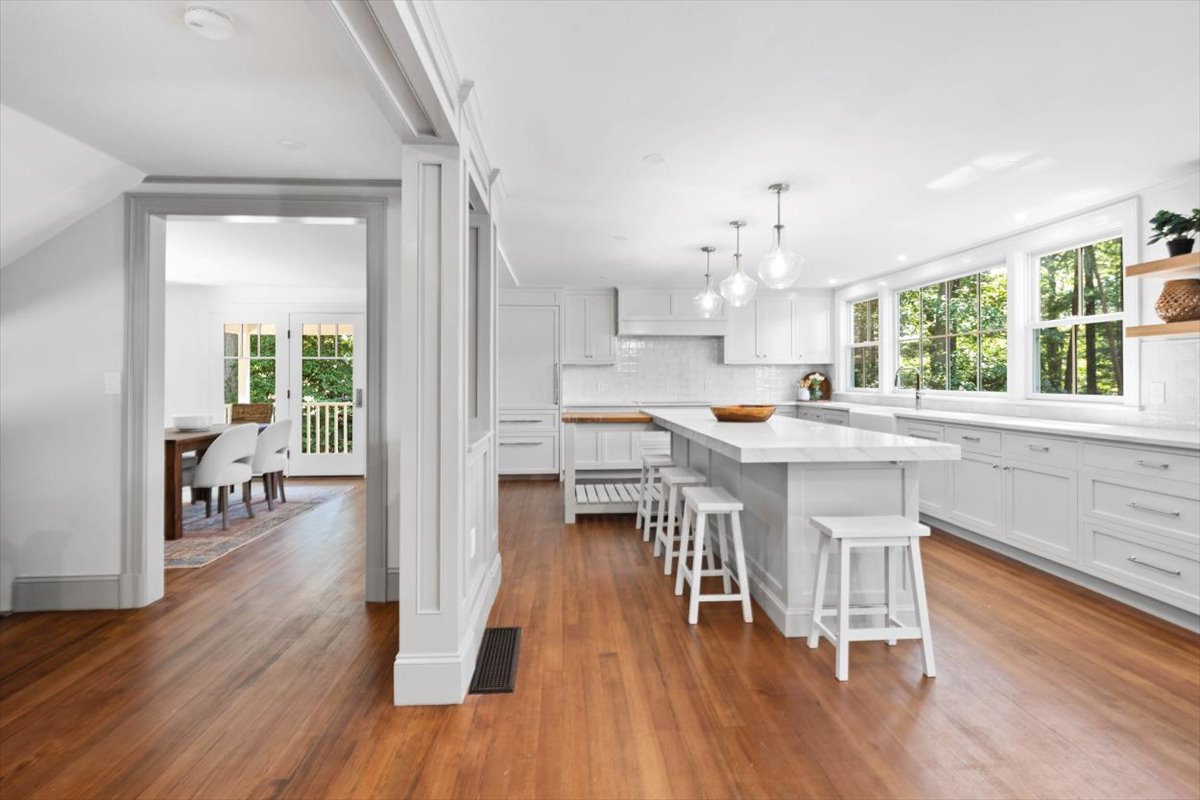49 Garrison Road Hingham, MA 02043 - Photo 2 of 30 a kitchen with counter top space a sink appliances and cabinets