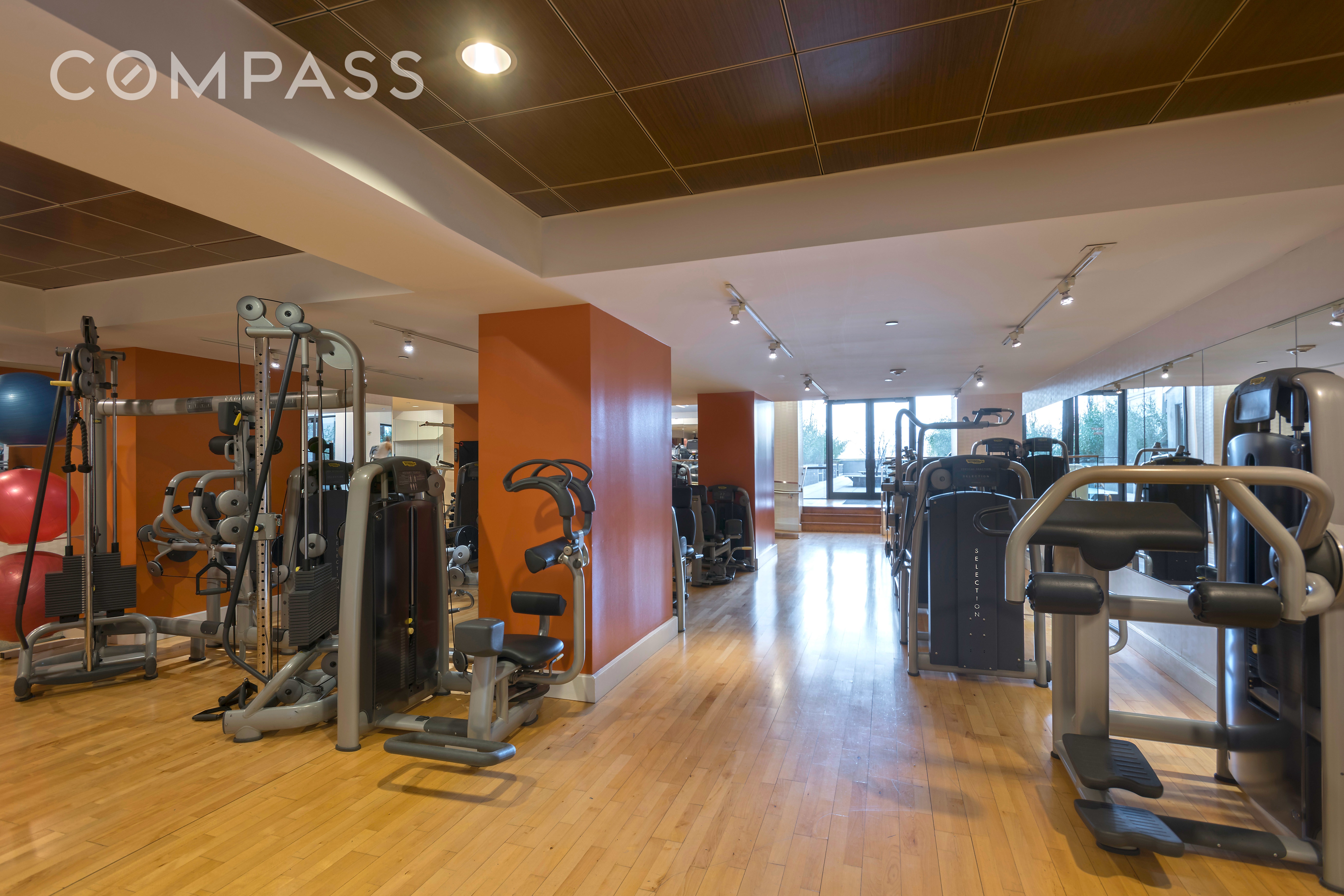 360 Furman Street, Unit 734 Brooklyn, NY 11201 - Photo 24 of 31 a view of a room with gym equipment