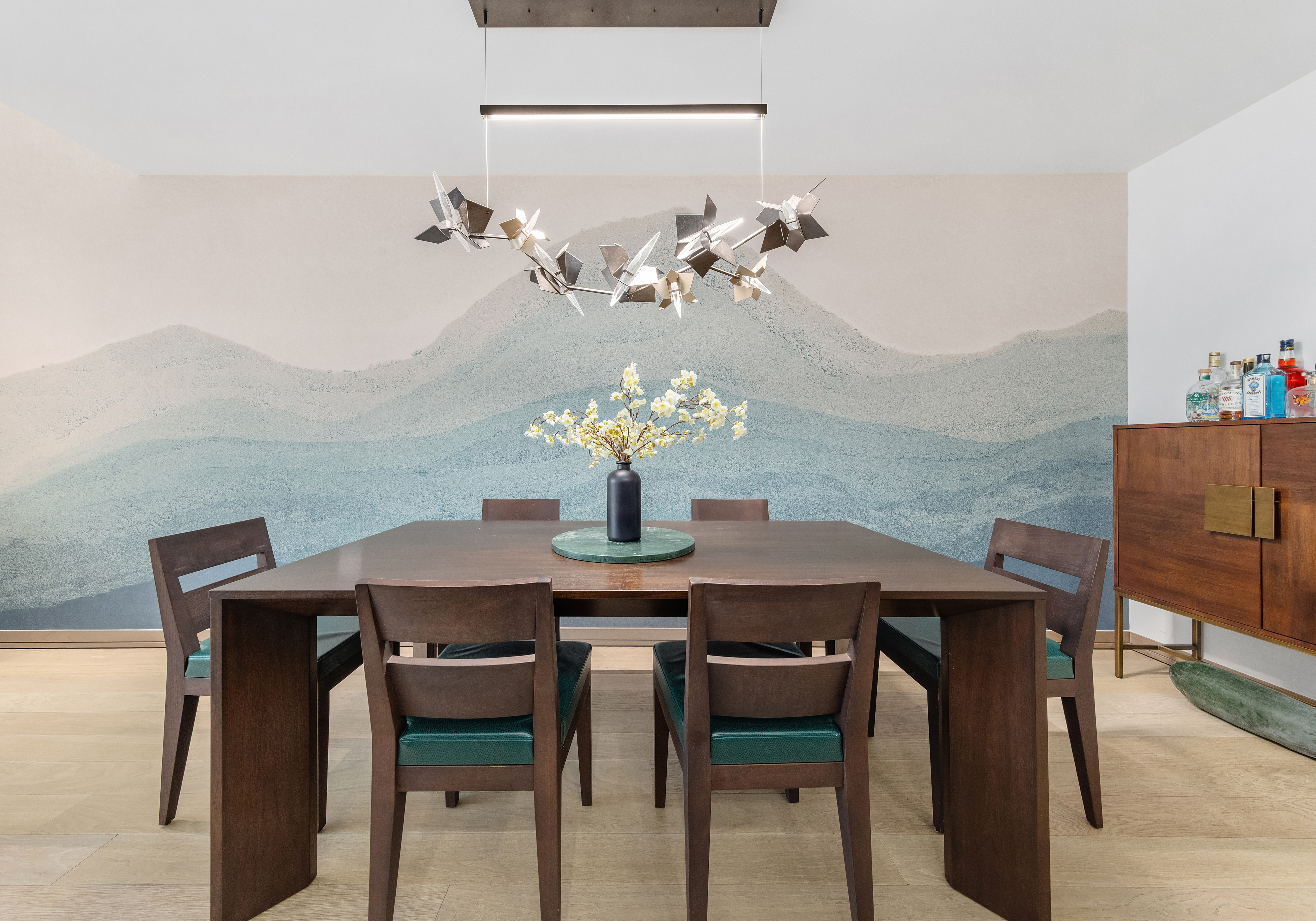 90 Lexington Avenue, Unit MC Manhattan, NY 10016 - Photo 4 of 26 a view of a dining room with furniture and chandelier