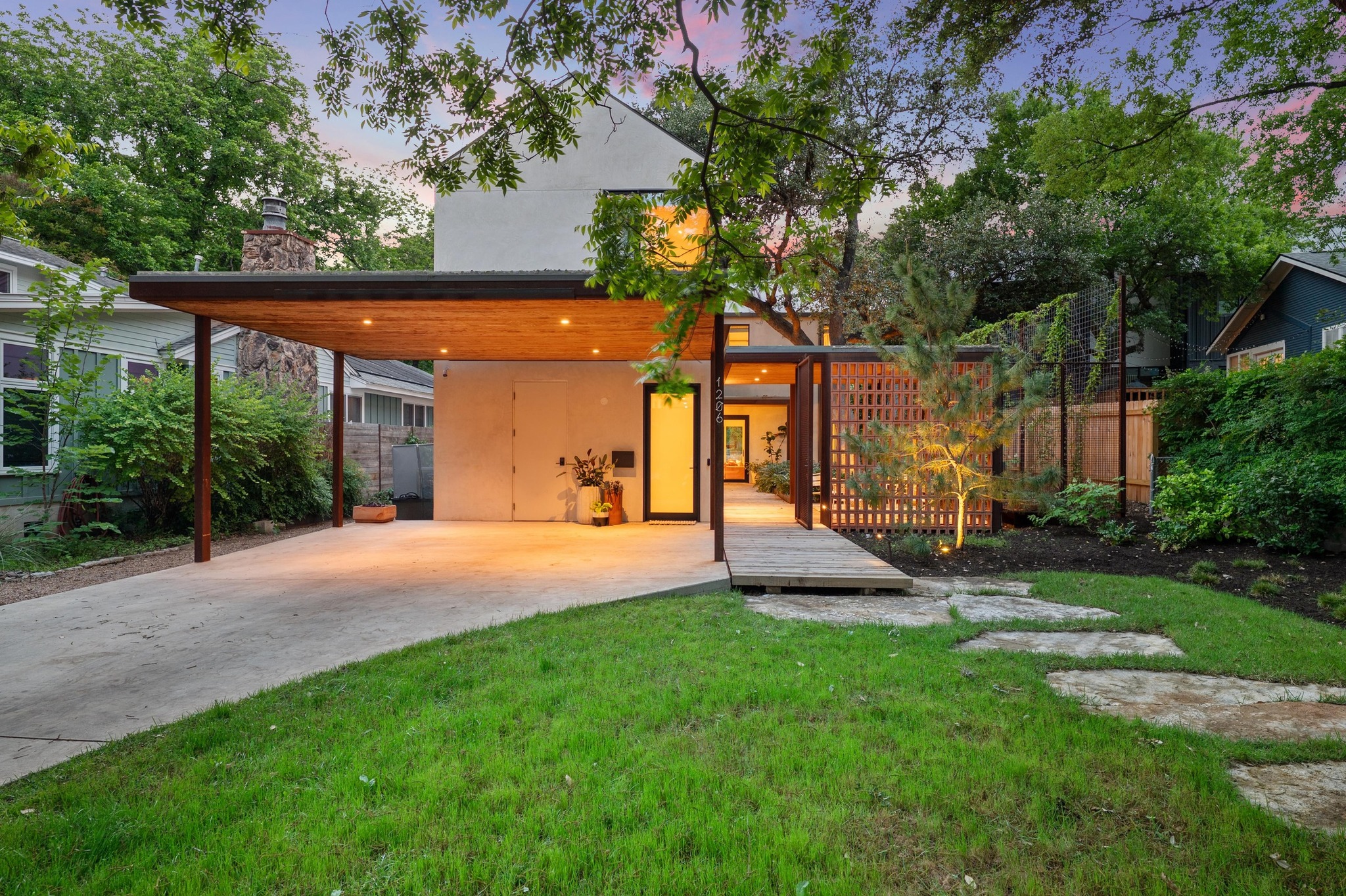 1206 Bickler Road Austin, TX 78704 - Photo 5 of 65 a view of a house with backyard and a tree