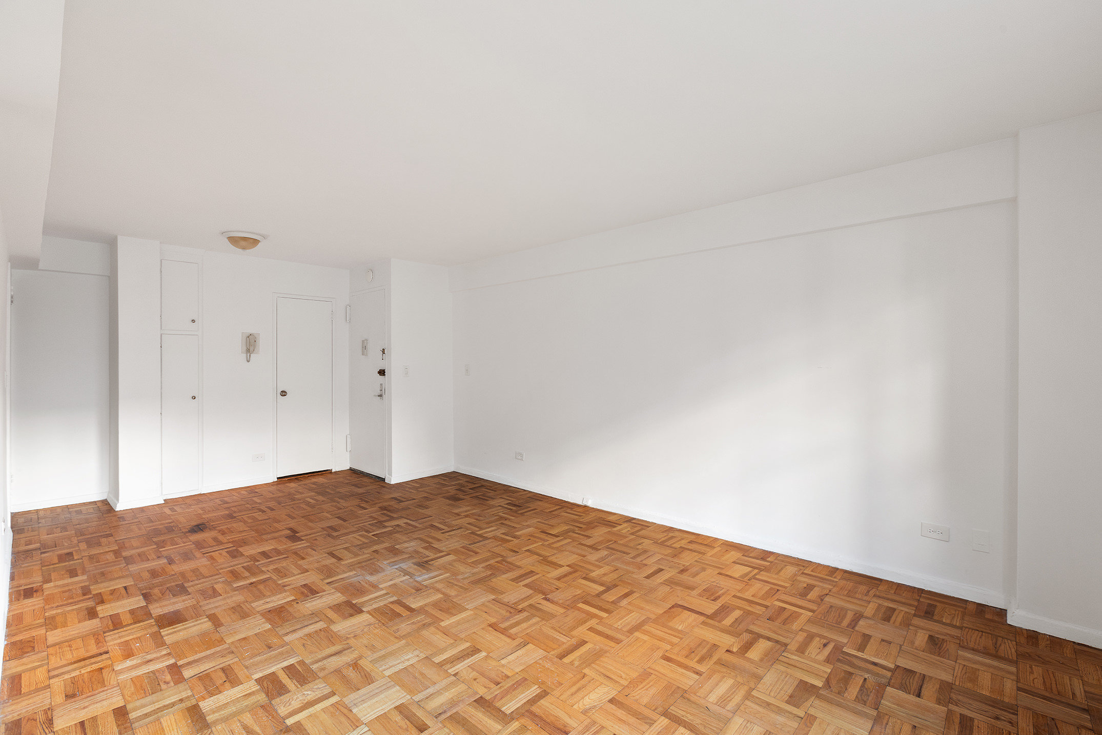 335 East 51st Street, Unit 6G Manhattan, NY 10022 - Photo 8 of 12 a view of empty room