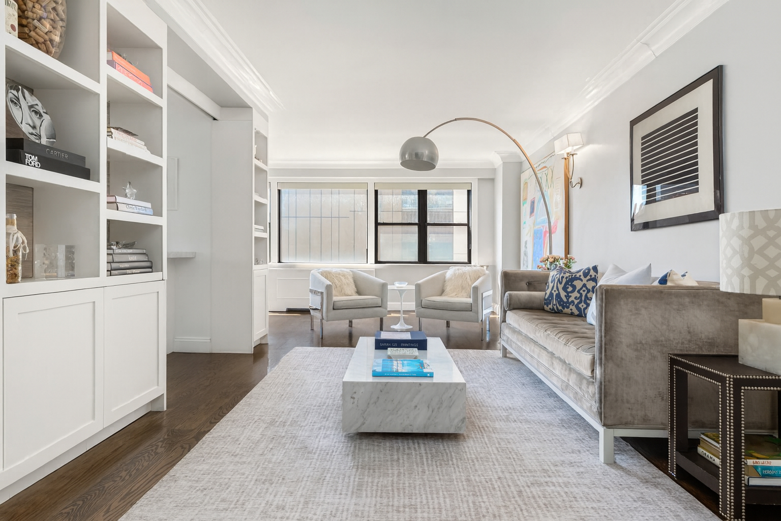 201 East 77th Street, Unit 14AF Manhattan, NY 10075 - Photo 1 of 13 a living room with furniture and a large window