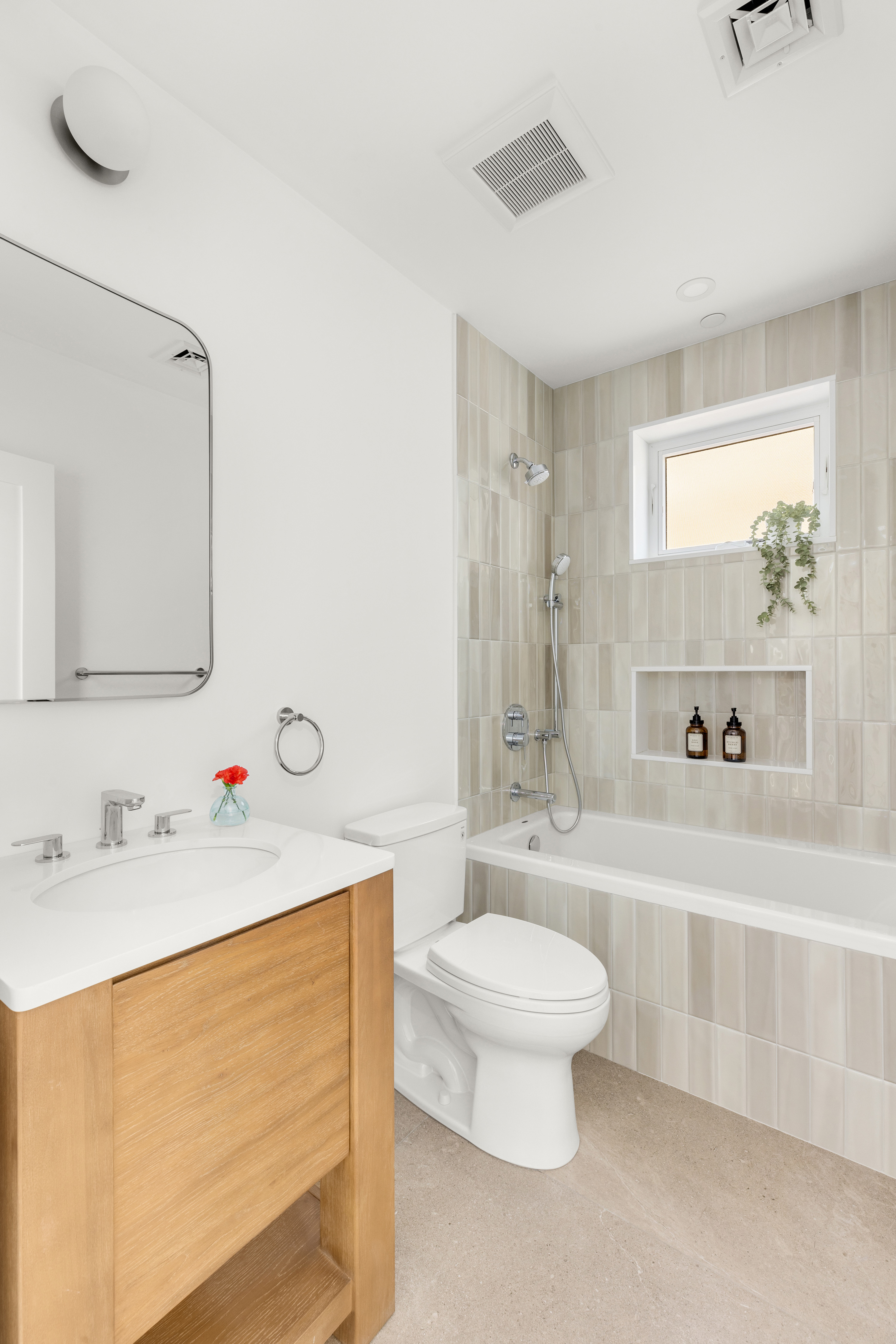 578 20th Street Brooklyn, NY 11218 - Photo 15 of 28 a bathroom with a sink a toilet and a bathtub