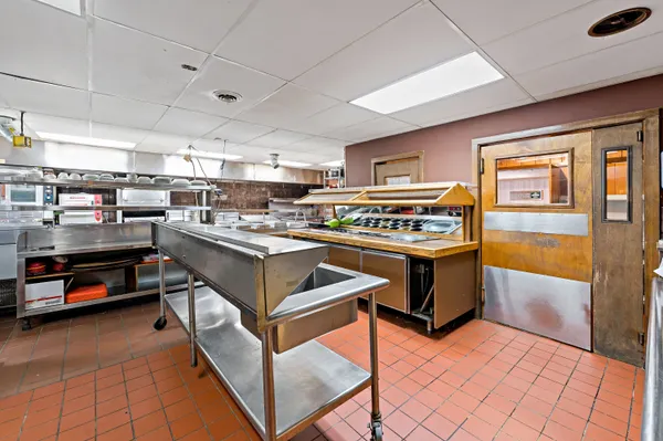 a kitchen with stainless steel appliances granite countertop a sink counter space and stainless steel appliances