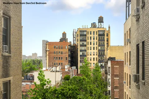 a view of a city with tall buildings