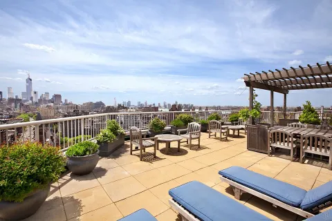 a view of a terrace with furniture