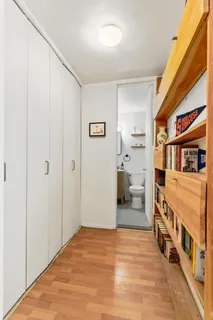 a bedroom with furniture and white walls