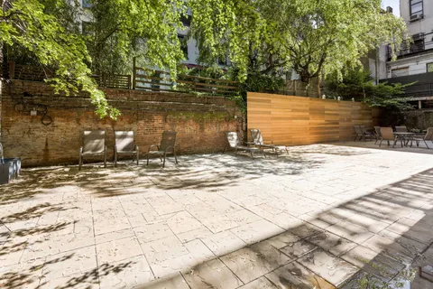 a view of a backyard of a house