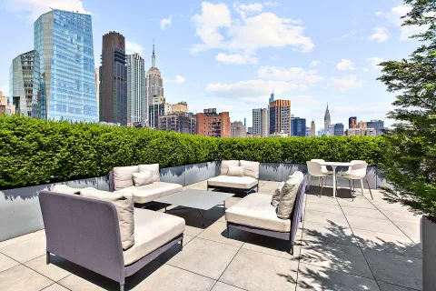 a view of a terrace with couches and a table