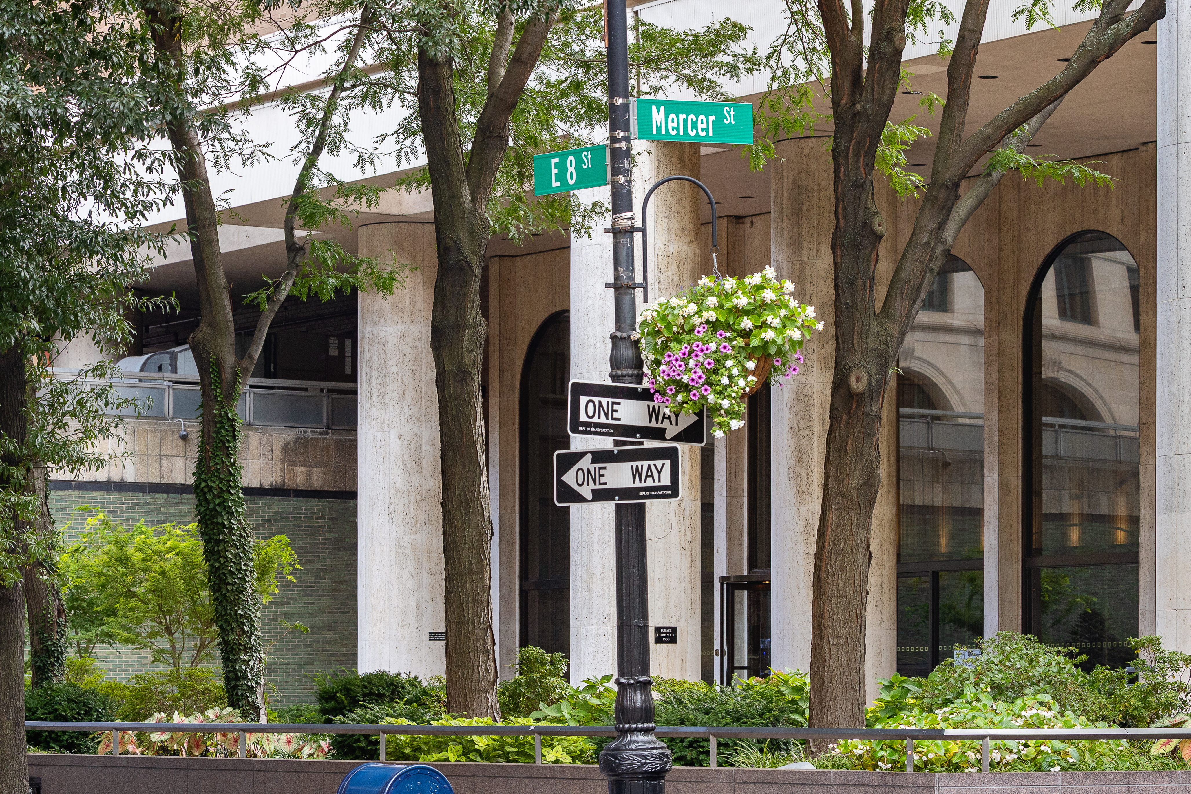 60 East 8th Street, Unit 20P Manhattan, NY 10003 - Photo 10 of 11 a front view of a house with a garden
