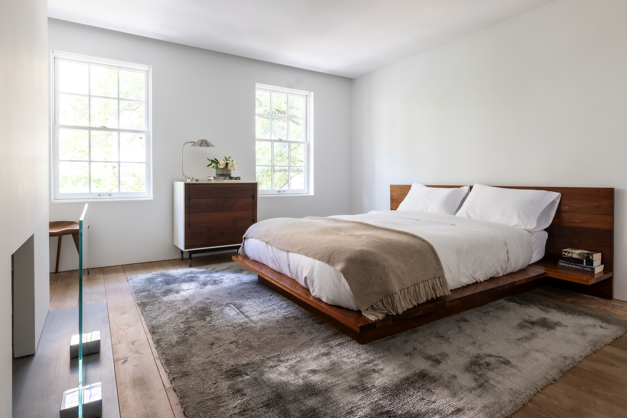 130 Charles Street Manhattan, NY 10014 - Photo 11 of 15 a bedroom with a bed and window