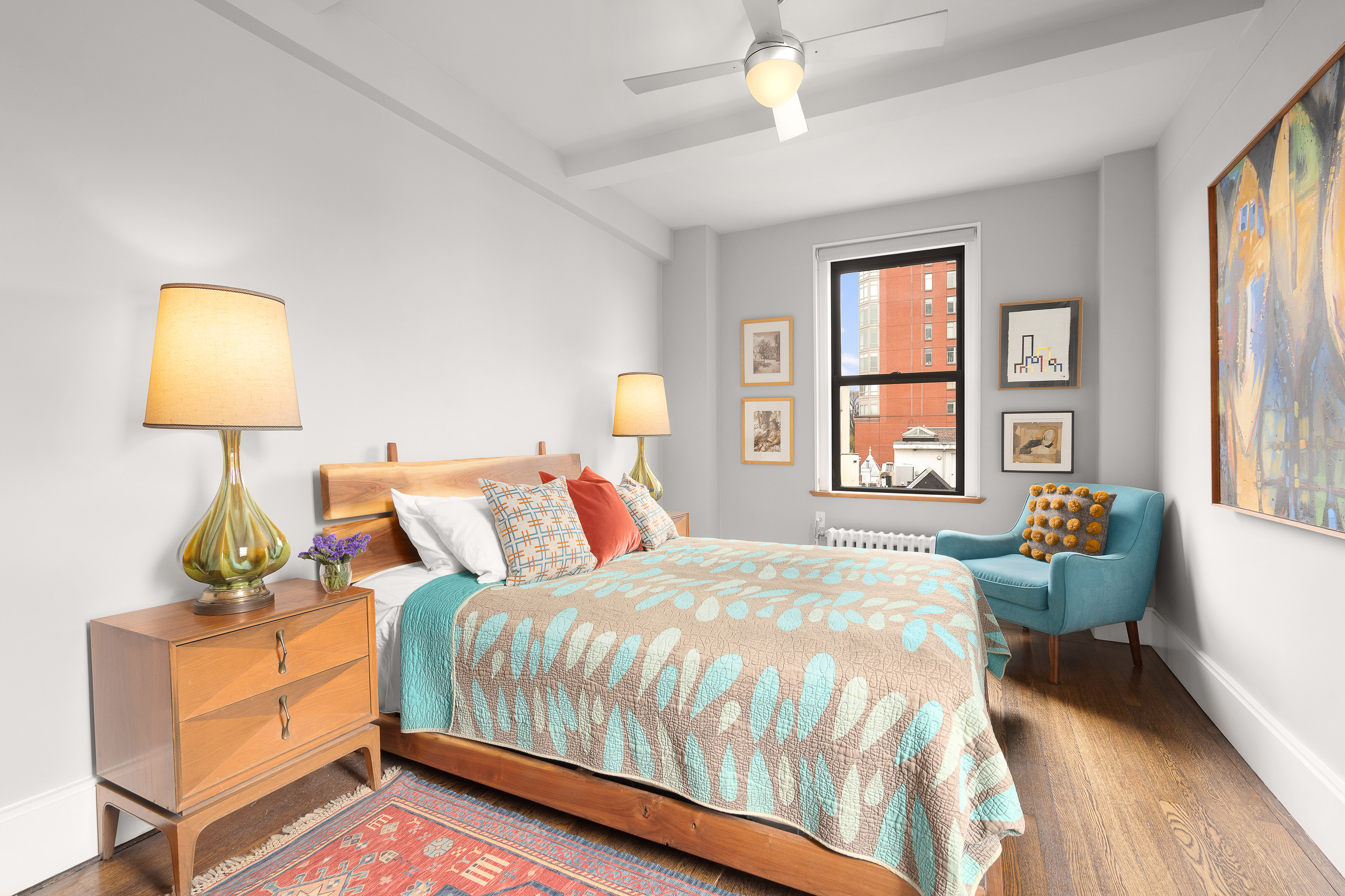 50 West 106th Street, Unit 6D Manhattan, NY 10025 - Photo 5 of 8 a bed sitting in a bedroom next to a window
