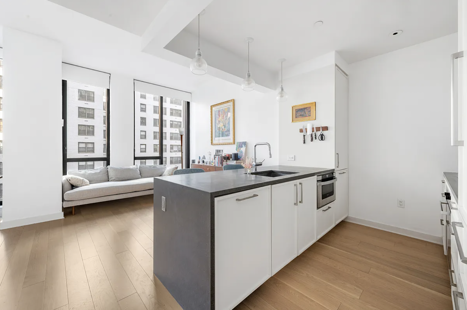 160 East 22nd Street, Unit 4D Manhattan, NY 10010 - Photo 3 of 15 a view of kitchen with sink and wooden floor