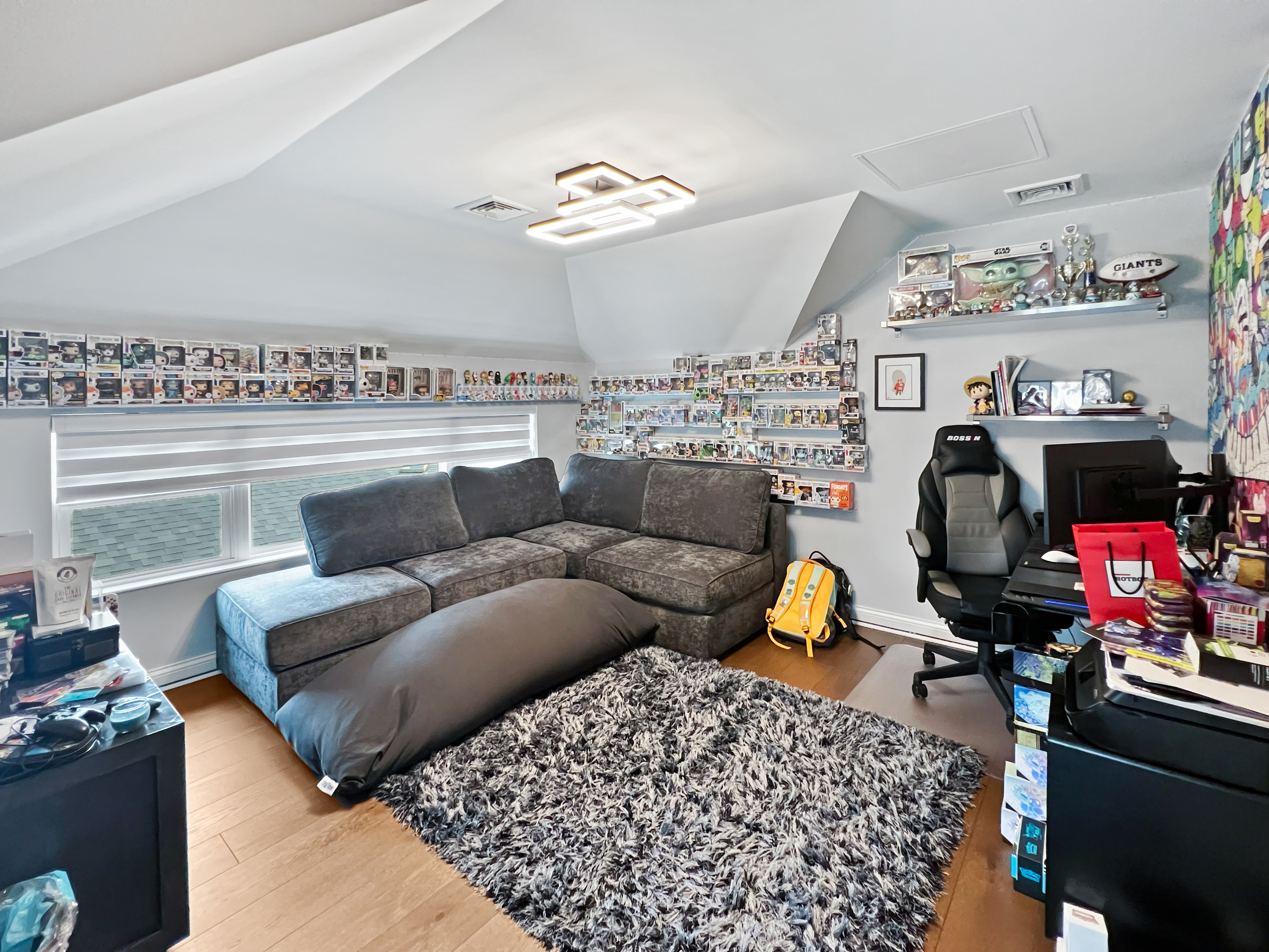 5021 Surf Avenue Brooklyn, NY 11224 - Photo 19 of 32 a living room with furniture a rug and white walls