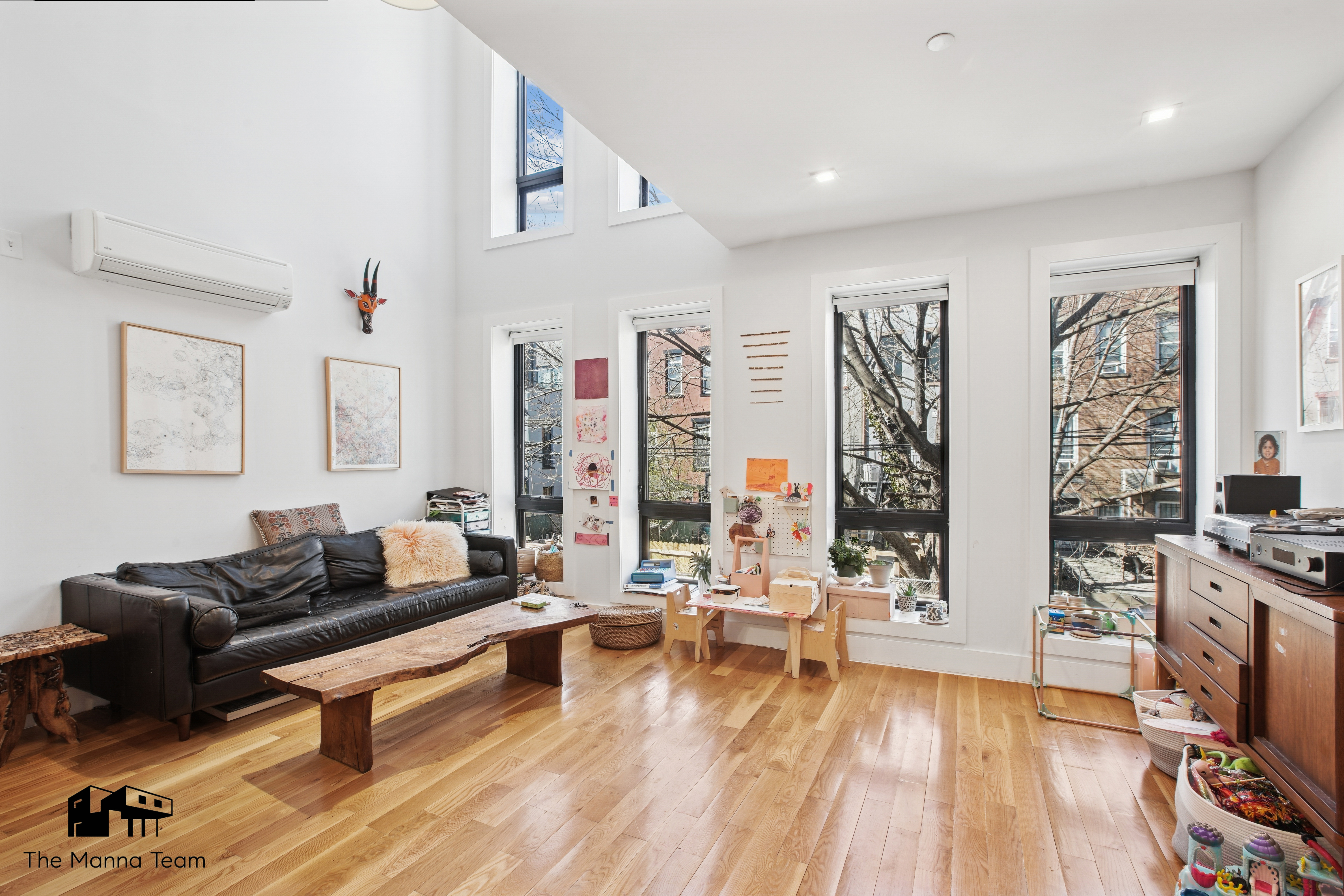 385 Jefferson Avenue, Unit C Brooklyn, NY 11221 - Photo 4 of 21 a living room with furniture window and wooden floor