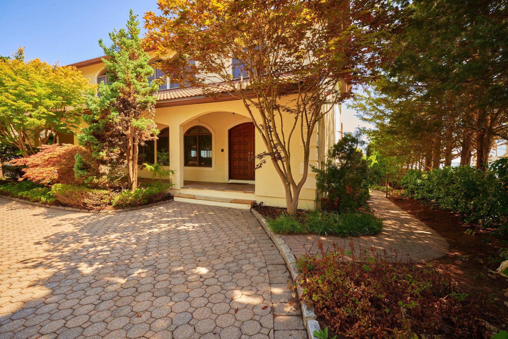 3411 Country Club Road Bronx, NY 10465 - Photo 50 of 54 a front view of a house with a yard