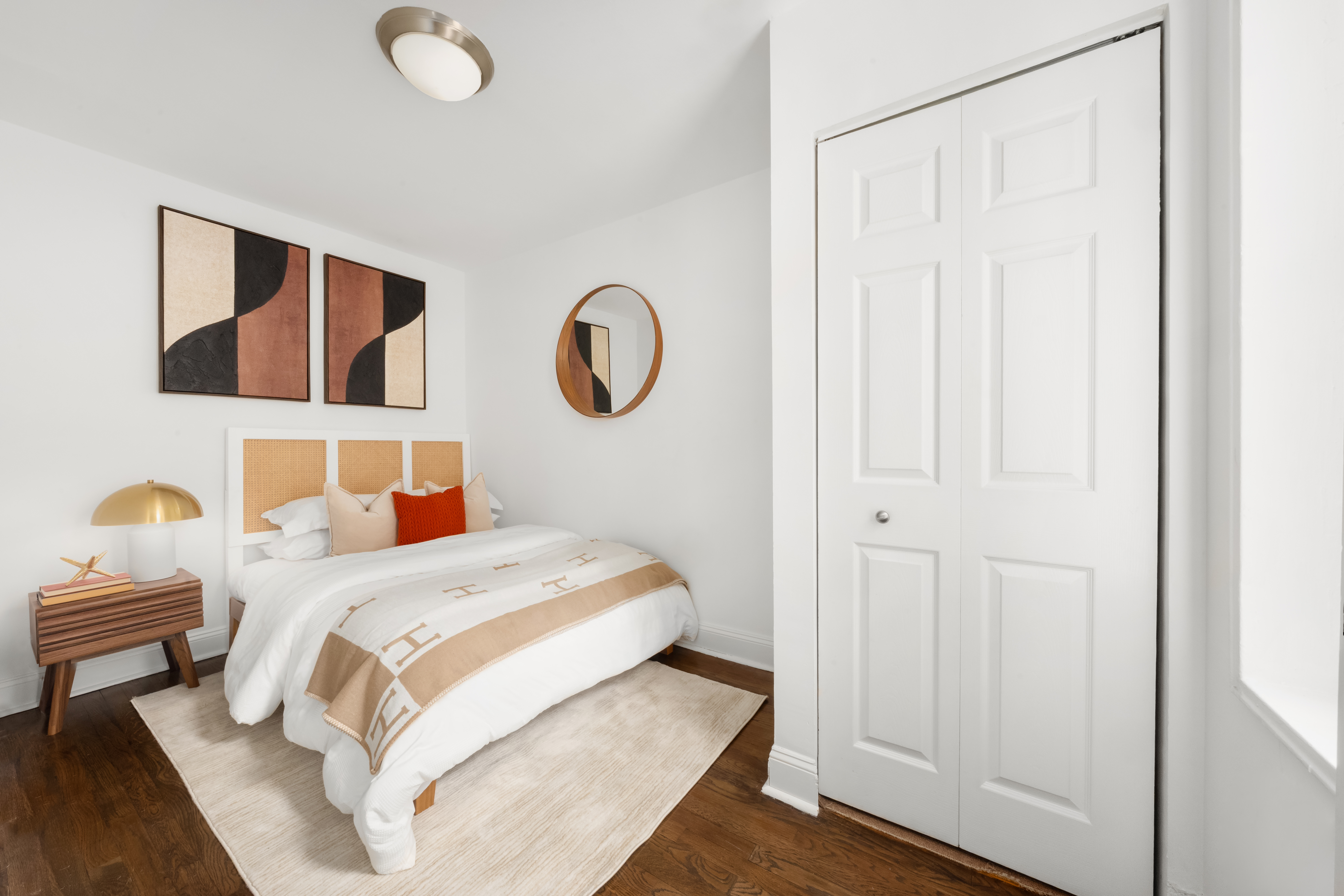 140 7th Avenue, Unit 4M Manhattan, NY 10011 - Photo 6 of 8 a bedroom with a bed and a window