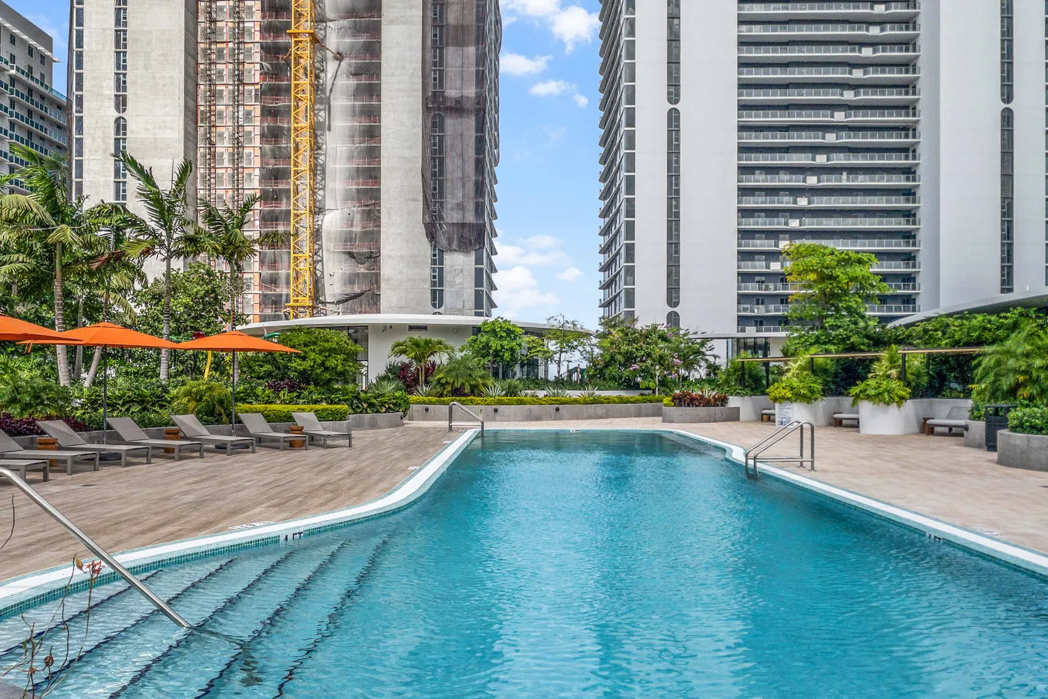 a front view of building and lake view