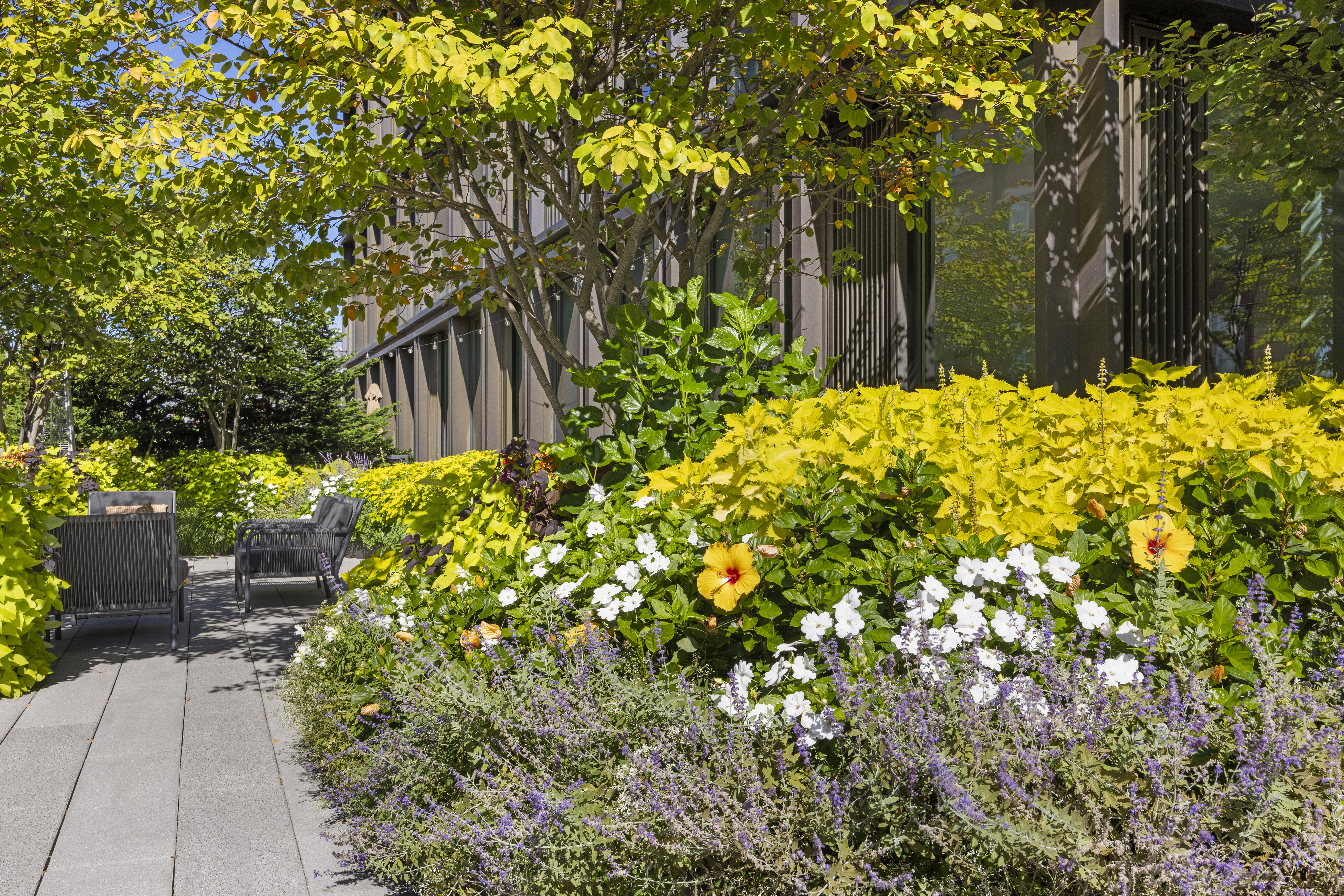 100 Barrow Street, Unit 7/8A Manhattan, NY 10014 - Photo 9 of 23 a view of yellow house with a yard