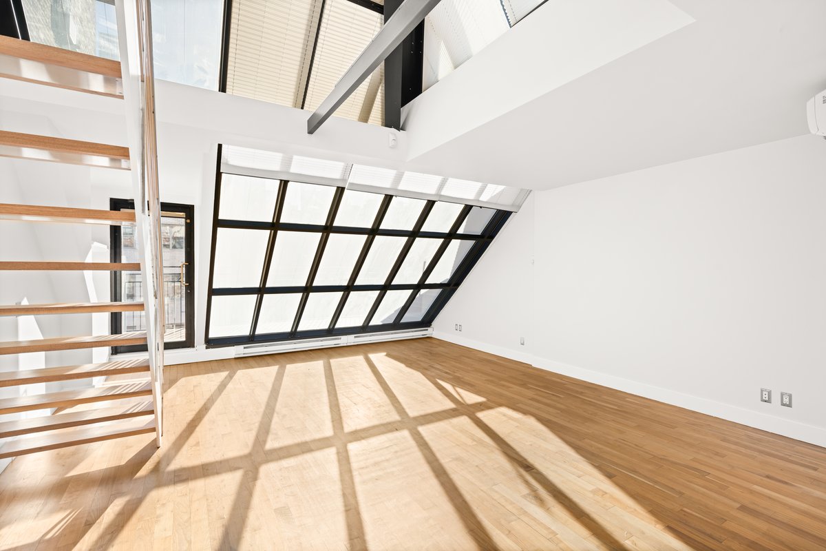 23 East 67th Street, Unit PH6 Manhattan, NY 10065 - Photo 2 of 7 a view of an empty room