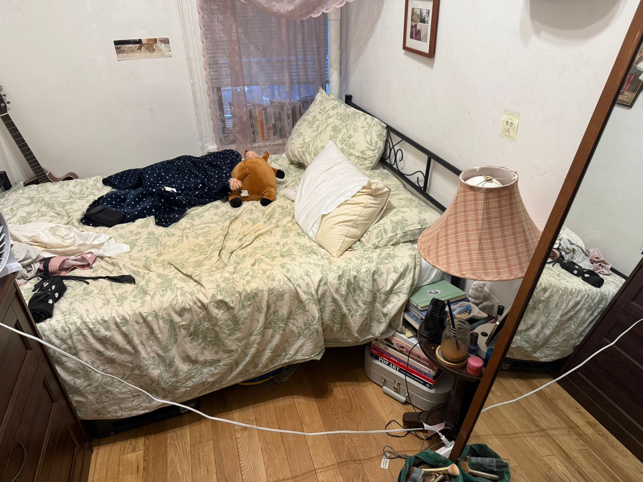 1278 1st Avenue, Unit 2 Manhattan, NY 10065 - Photo 12 of 19 a bed sitting in a bedroom next to a window