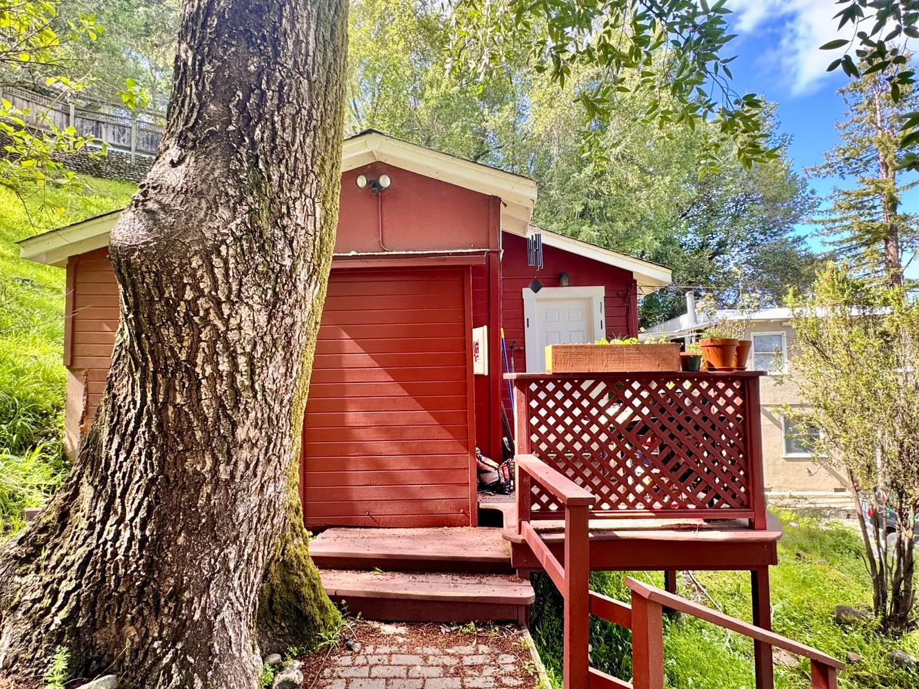 a view of a wooden door with a bench
