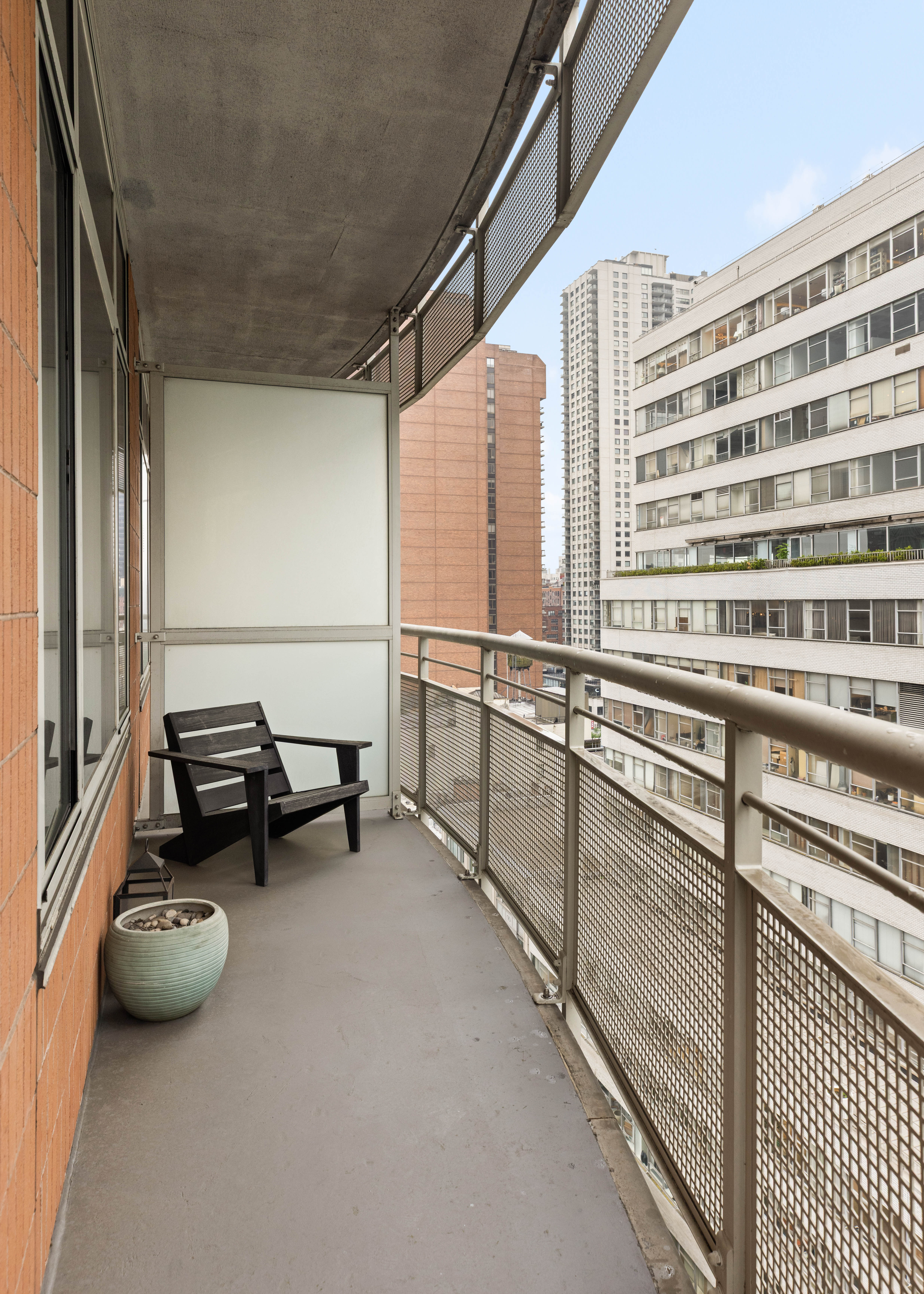 205 East 59th Street, Unit 14B Manhattan, NY 10022 - Photo 12 of 19 a view of work space with furniture and window