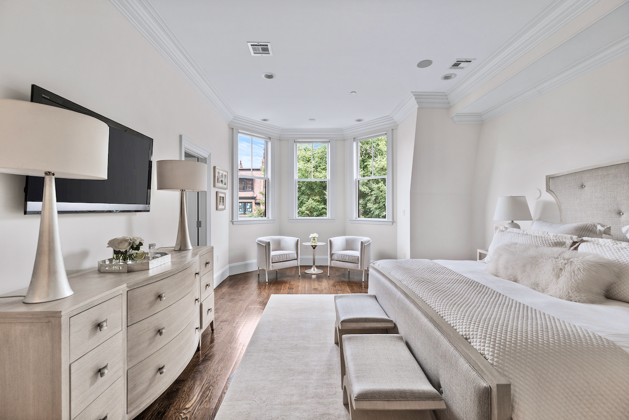 361 Beacon Street, Unit PH Boston, MA 02116 - Photo 5 of 9 a room with furniture a large window and a chandelier