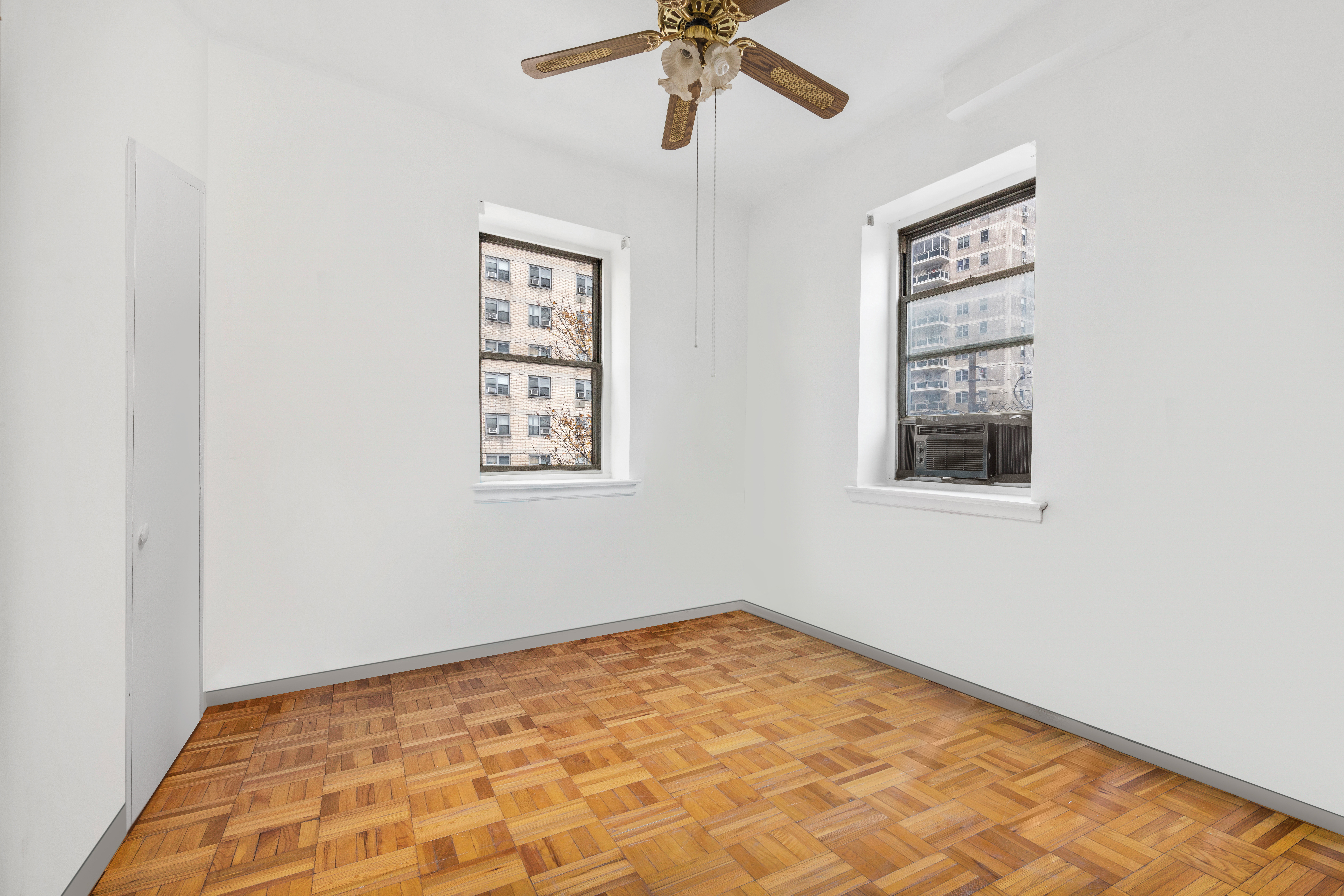 800 Grand Concourse, Unit GMS Bronx, NY 10451 - Photo 7 of 13 a view of an empty room with a window