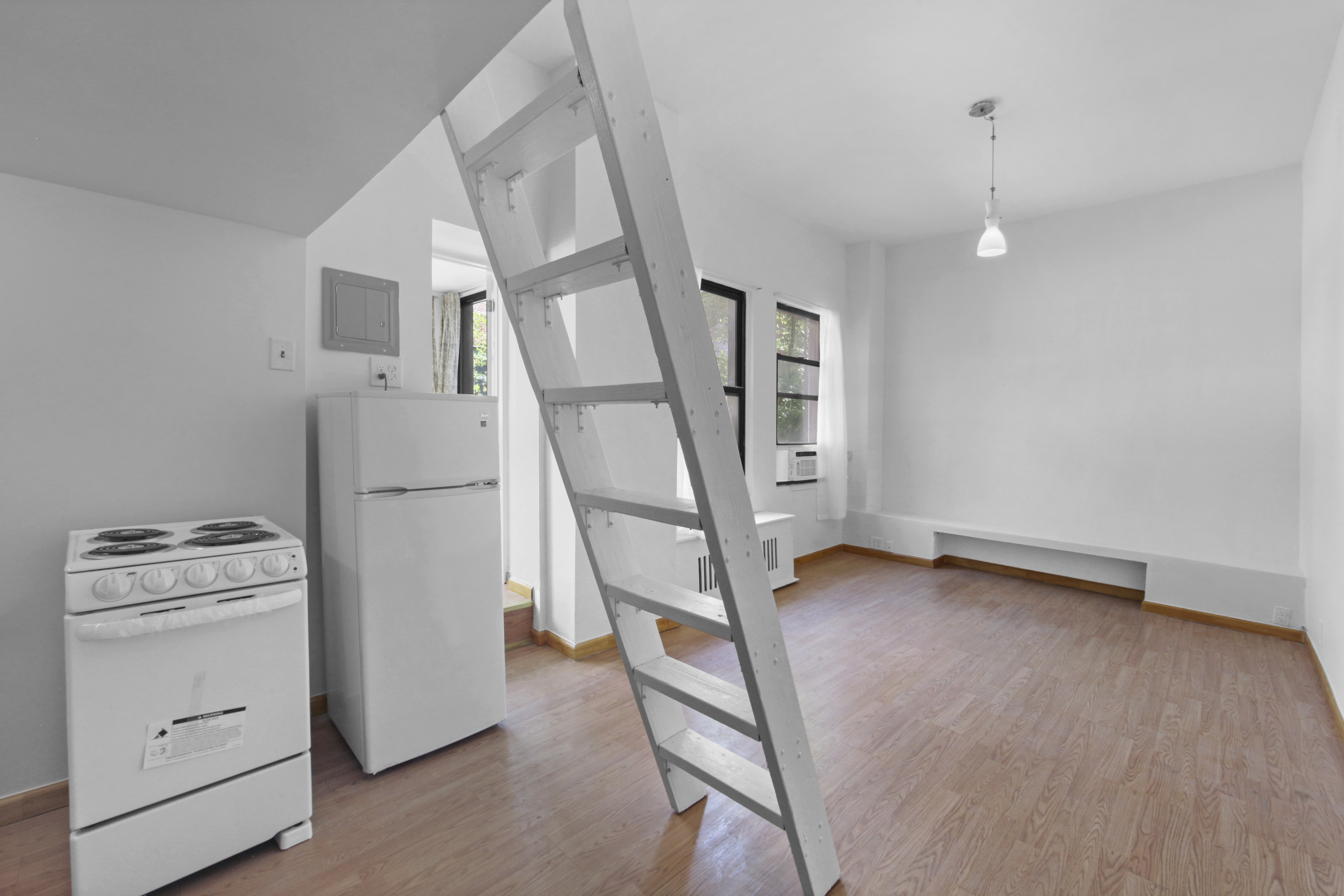 155 Hicks Street, Unit 2B Brooklyn, NY 11201 - Photo 3 of 11 a view of hallway with stairs and wooden floor