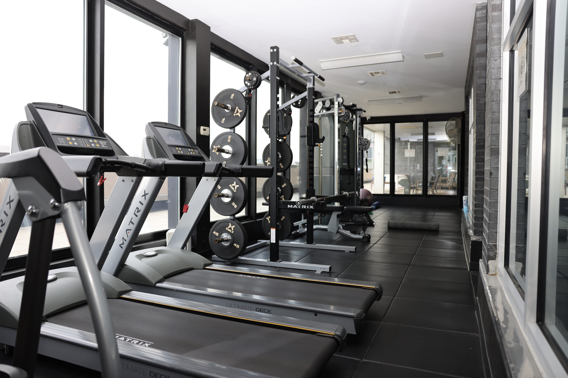 50 Bayard Street, Unit 1B Brooklyn, NY 11211 - Photo 9 of 13 a view of a room with gym equipment