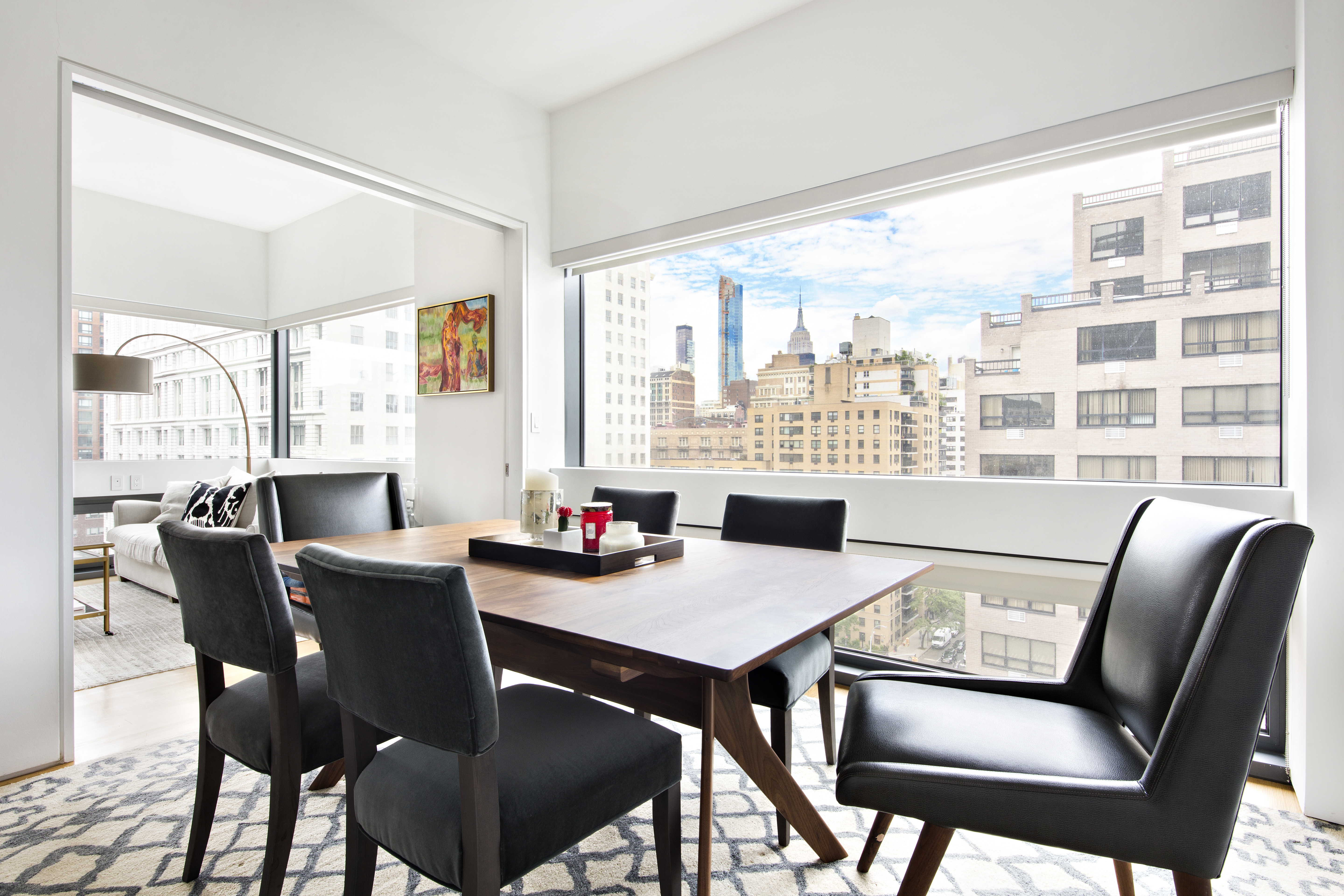 123 3rd Avenue, Unit 11A Manhattan, NY 10003 - Photo 4 of 11 a view of a dining room with furniture window and outside view