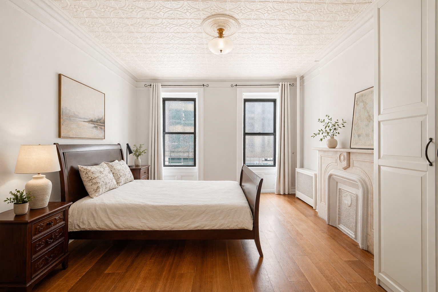 436 East 66th Street, Unit 4E Manhattan, NY 10065 - Photo 9 of 19 a bedroom with a bed and wooden floor