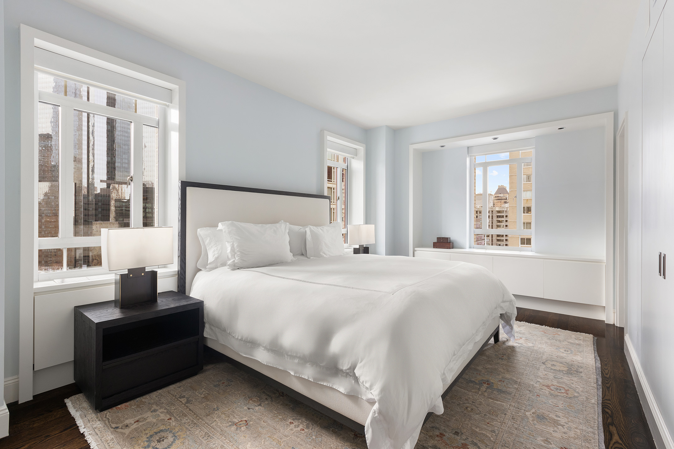 25 Central Park West, Unit 27J Manhattan, NY 10023 - Photo 9 of 13 a bedroom with a bed and a window