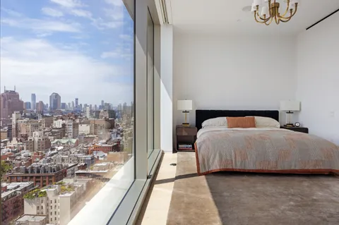 a living room with a couch and a flat screen tv