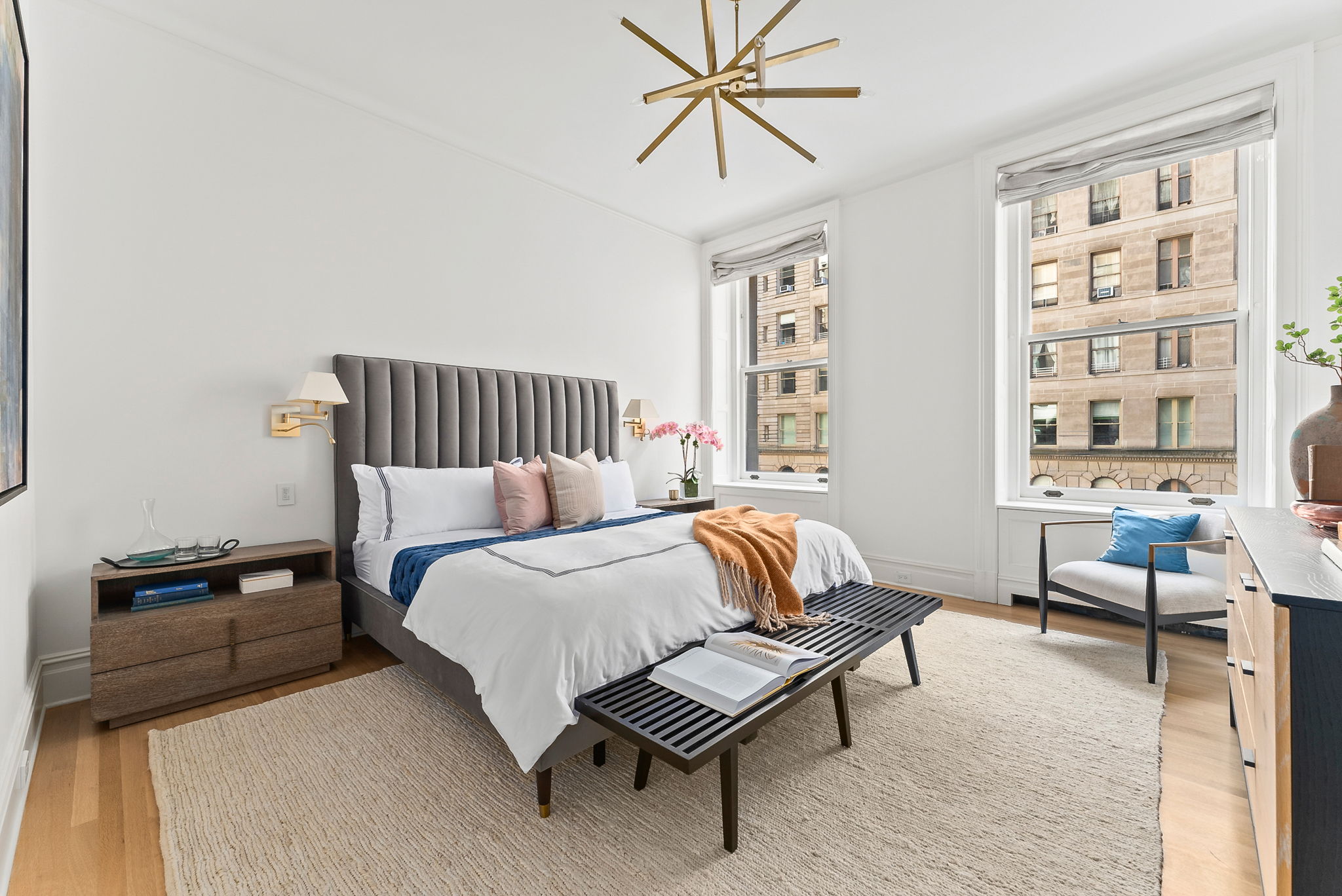 390 West End Avenue, Unit 4J Manhattan, NY 10024 - Photo 6 of 17 a bedroom with a bed and a couch