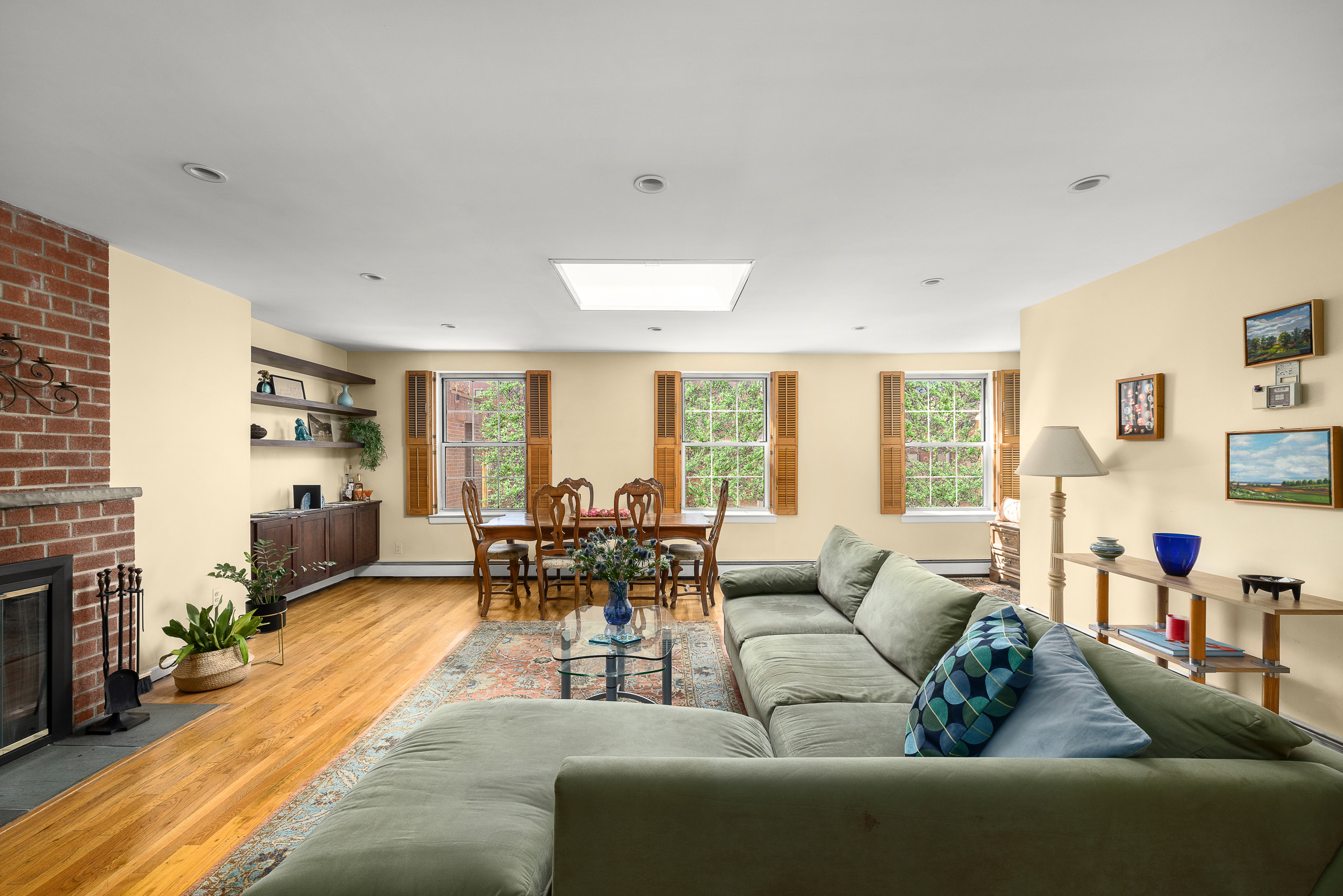 339 Sackett Street, Unit 3 Brooklyn, NY 11231 - Photo 3 of 8 a living room with furniture and a flat screen tv