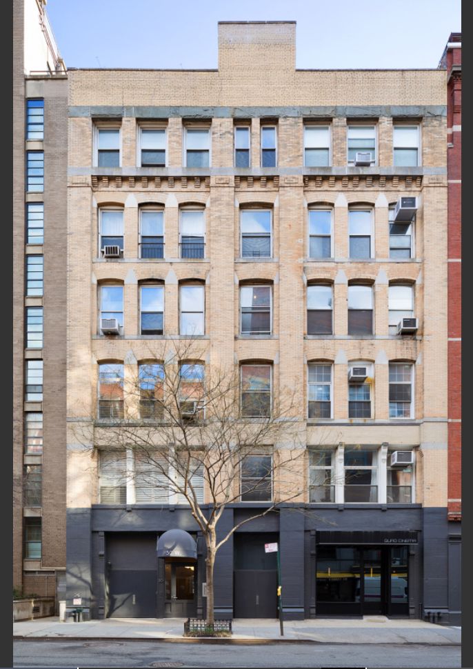 30 West 13th Street, Unit 4C Manhattan, NY 10011 - Photo 21 of 22 a front view of a building with a street