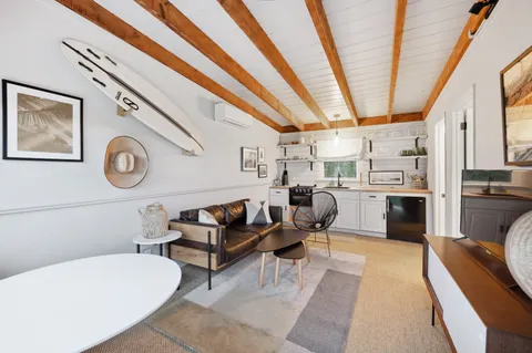 a kitchen with stainless steel appliances granite countertop a stove a refrigerator and a refrigerator