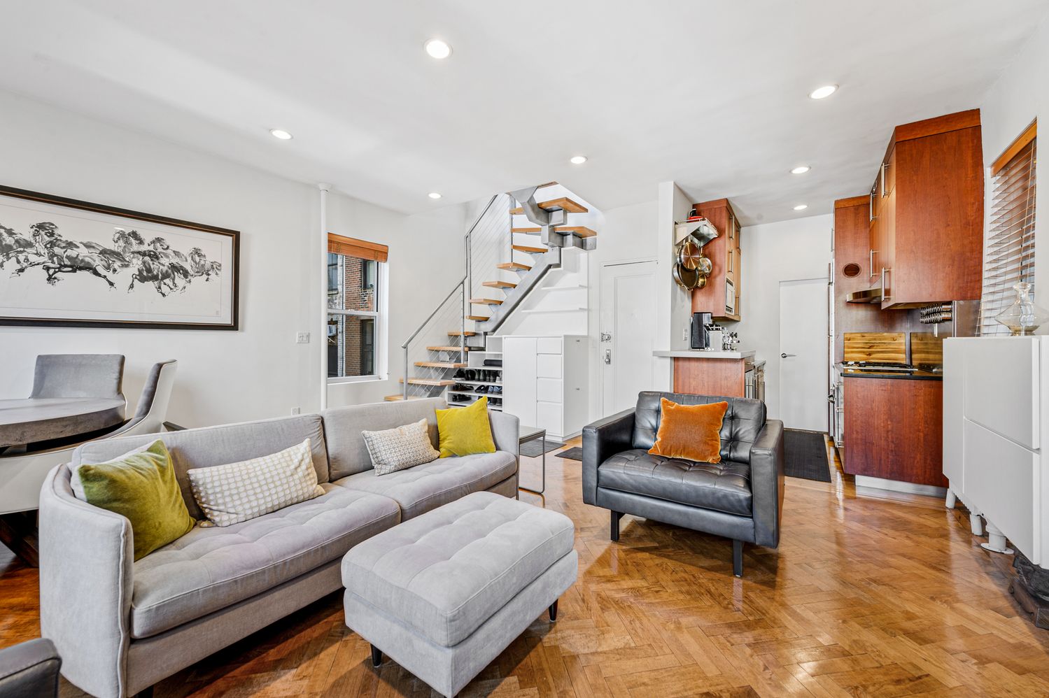 53 West 11th Street, Unit 4R/5R Manhattan, NY 10011 - Photo 2 of 9 a living room with furniture and wooden floor