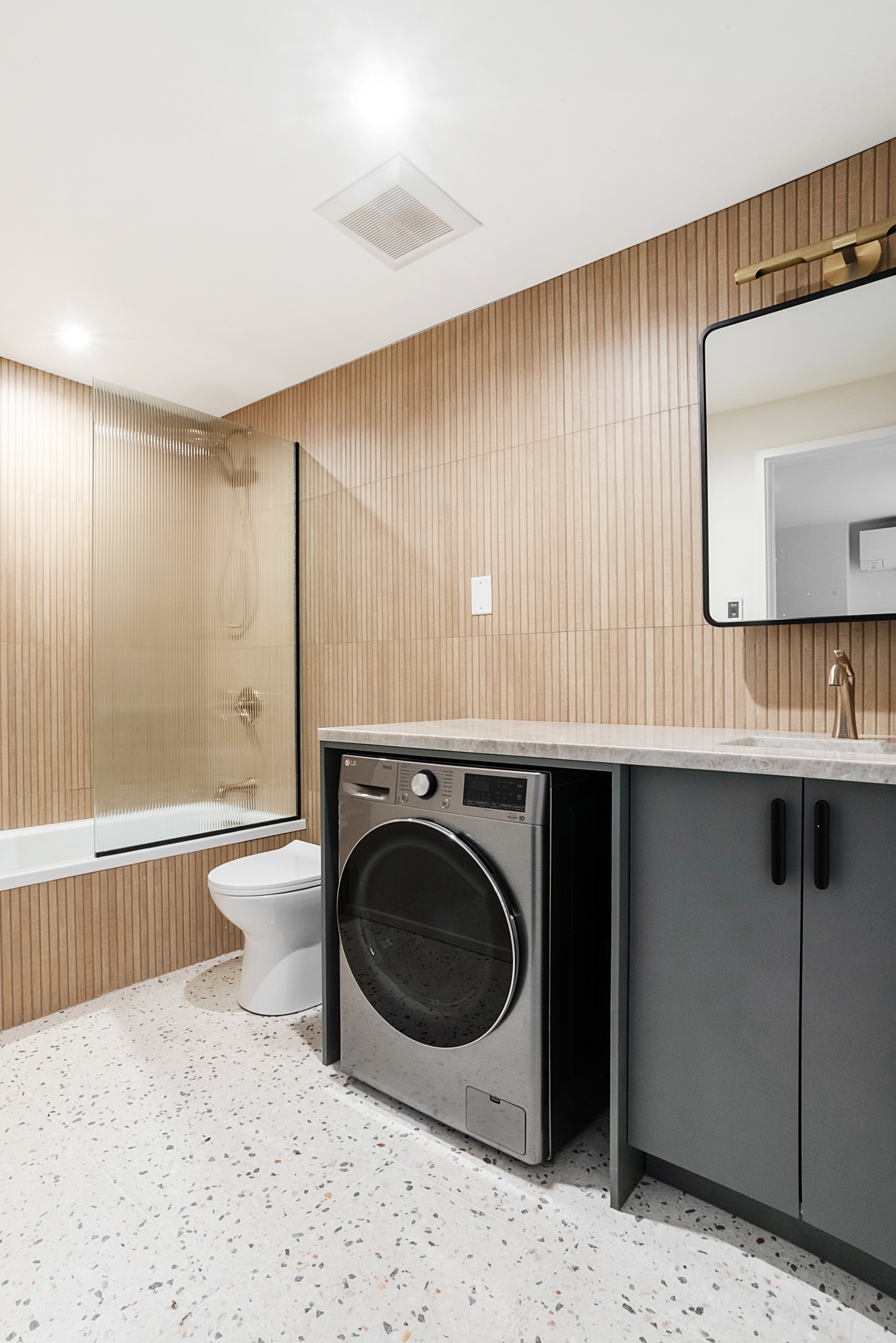 42 Monroe Street Brooklyn, NY 11238 - Photo 18 of 21 a bathroom with a sink a mirror and a bathtub