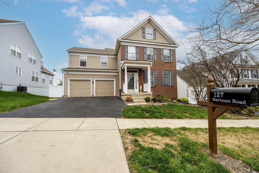 127 Hartman Road Pottstown, PA 19465 - Photo 3 of 42 front view of house with a yard
