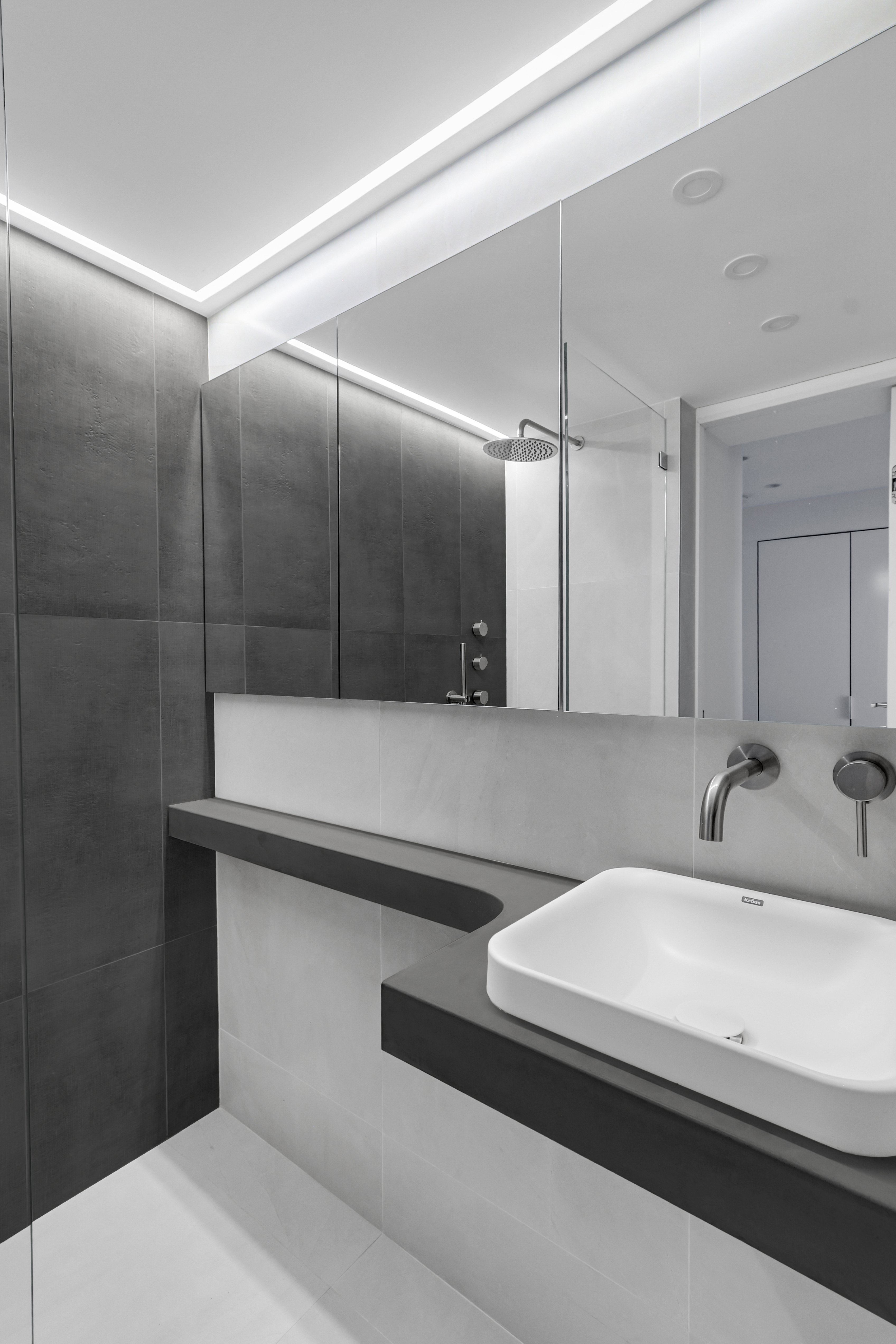 120 Central Park South, Unit 2 B C Manhattan, NY 10019 - Photo 10 of 13 a bathroom with a sink and a mirror