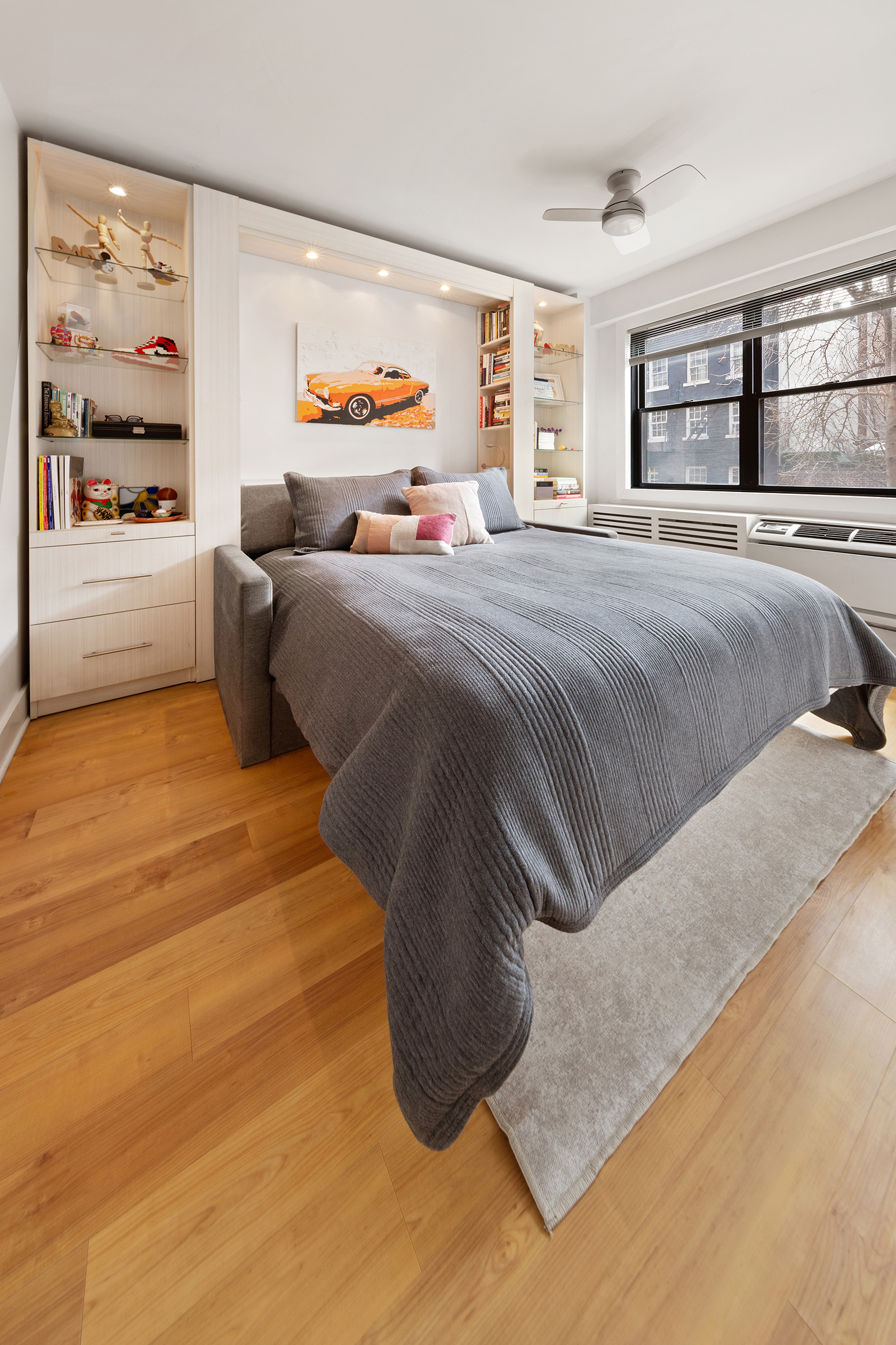 31 Jane Street, Unit 2CD Manhattan, NY 10014 - Photo 6 of 18 a bedroom with a bed and window