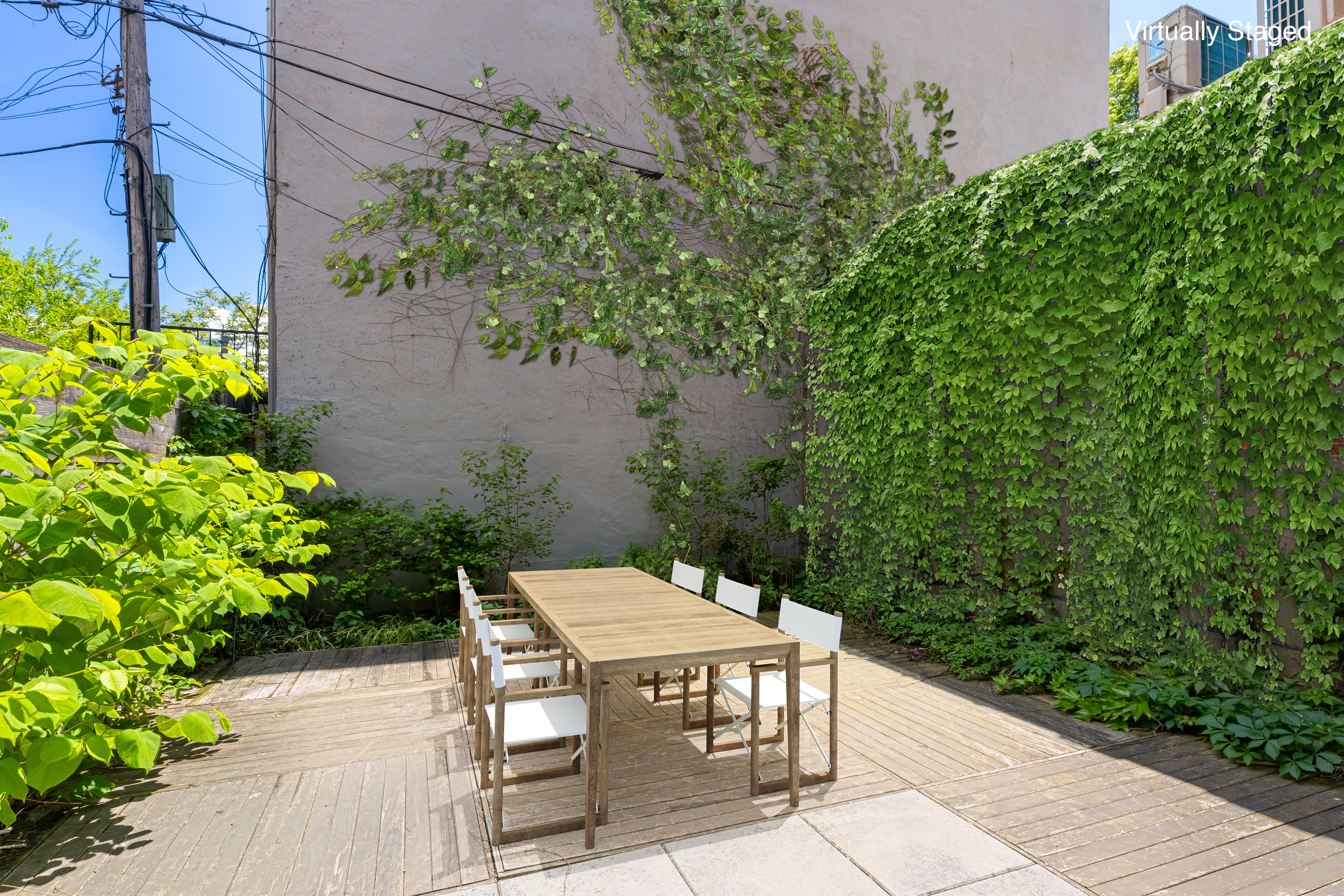 113 A Columbia Street Brooklyn, NY 11201 - Photo 19 of 21 a backyard with table and chairs with potted plants
