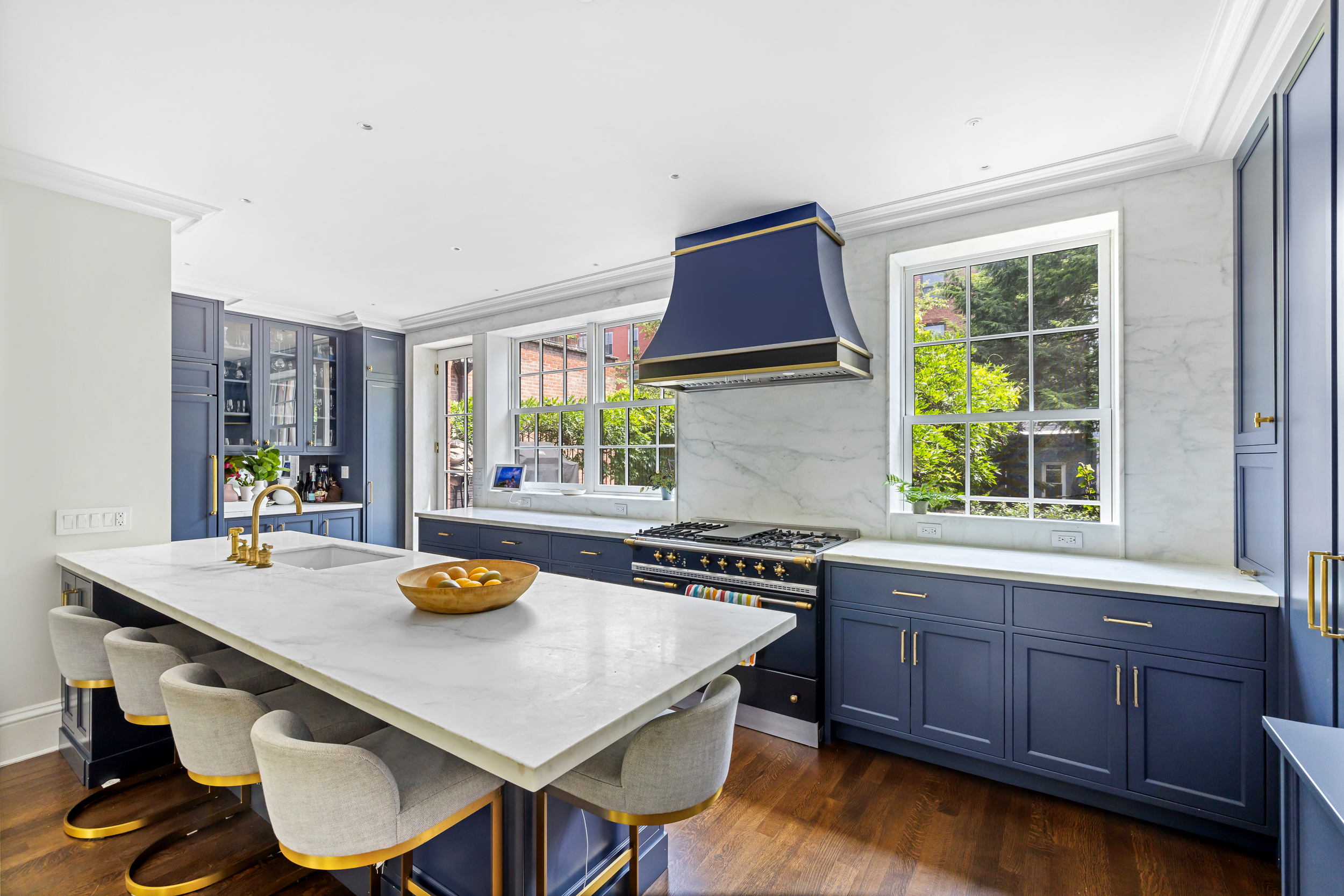 13 Garden Place, Unit B Brooklyn, NY 11201 - Photo 5 of 22 a kitchen with a table chairs stove and wooden floor
